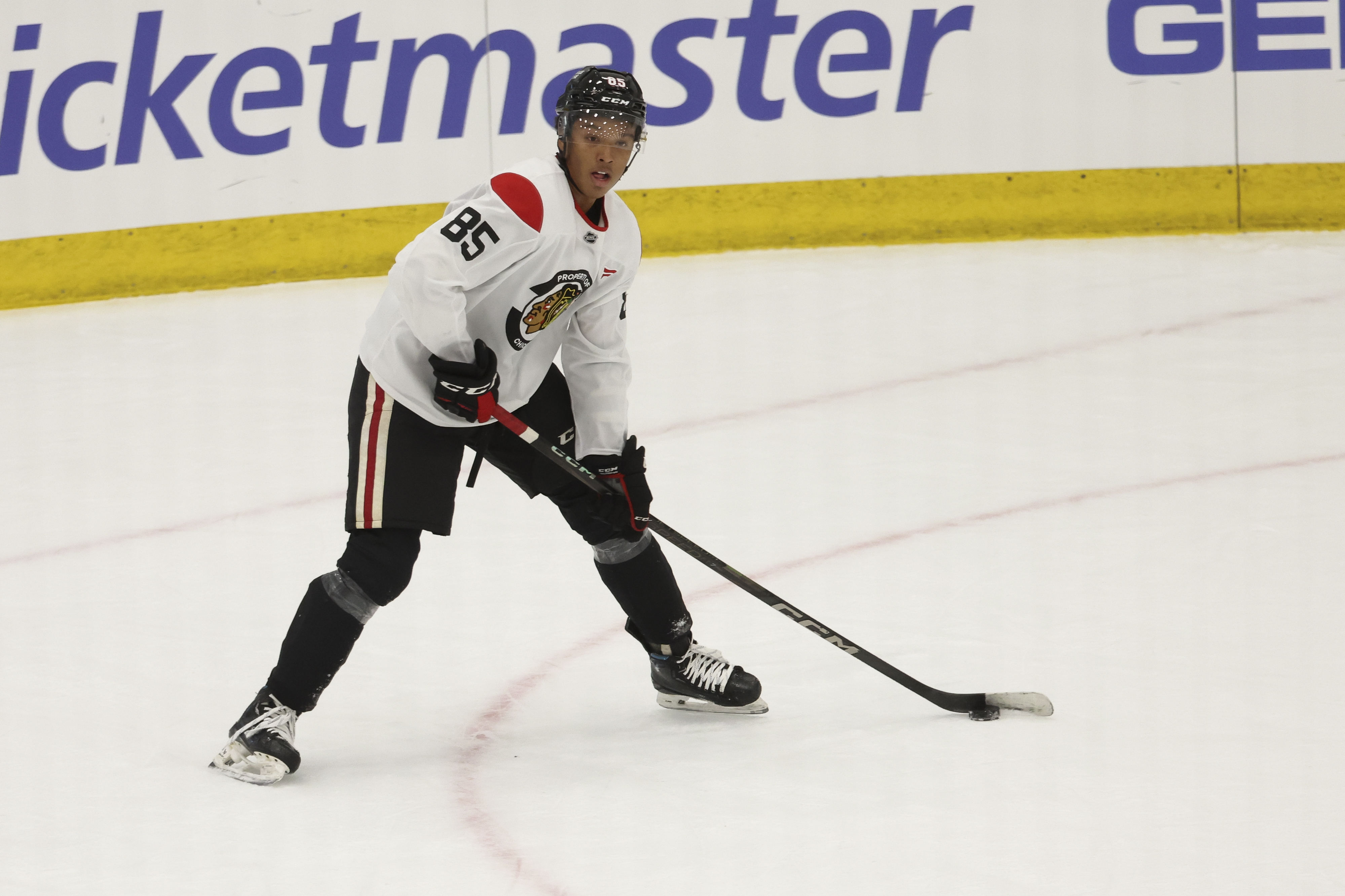 Chicago Blackhawks prospect Ty Henry (85) looks to pass the puck during the first day of training camp at Fifth Third Arena on Thursday, Sept. 19, 2024. (Eileen T. Meslar/Chicago Tribune)