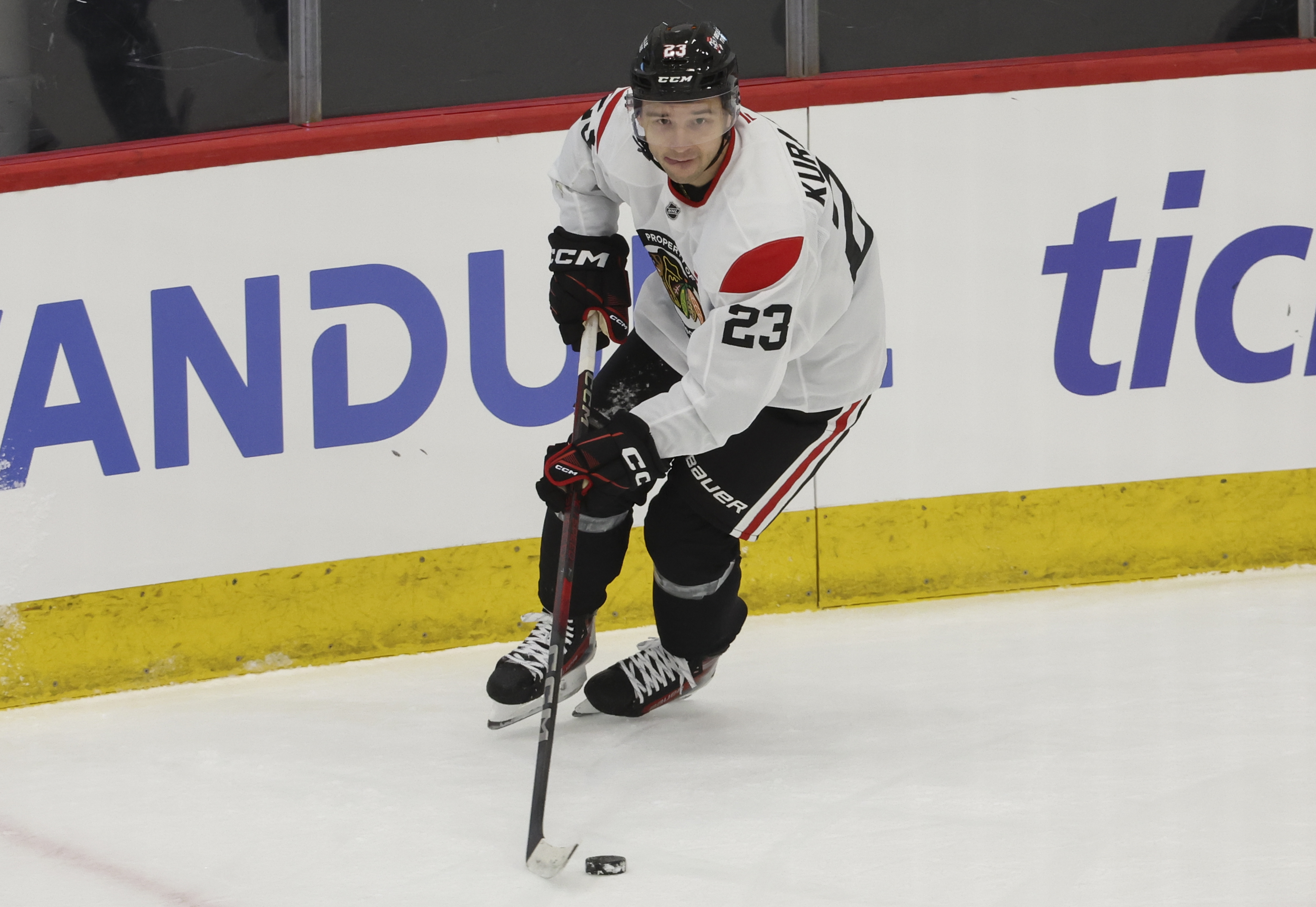 Chicago Blackhawks forward Philipp Kurashev skates with the puck during the first day of training camp at Fifth Third Arena on Thursday, Sept. 19, 2024. (Eileen T. Meslar/Chicago Tribune)