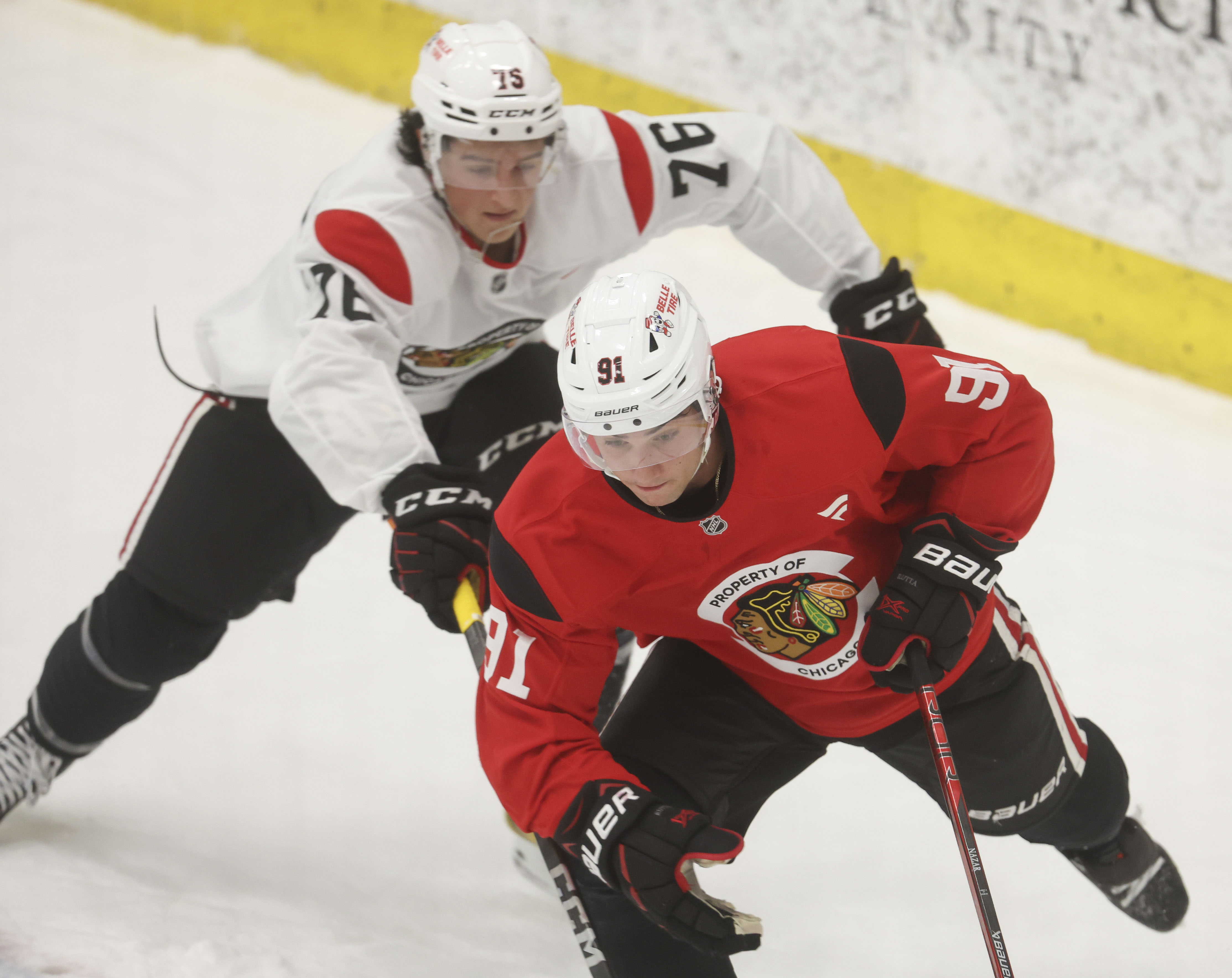 Blackhawks center Frank Nazar (91) and left wing Nick Lardis (76) during practice on Sept. 11, 2024, at Fifth Third Arena. (Brian Cassella/Chicago Tribune)