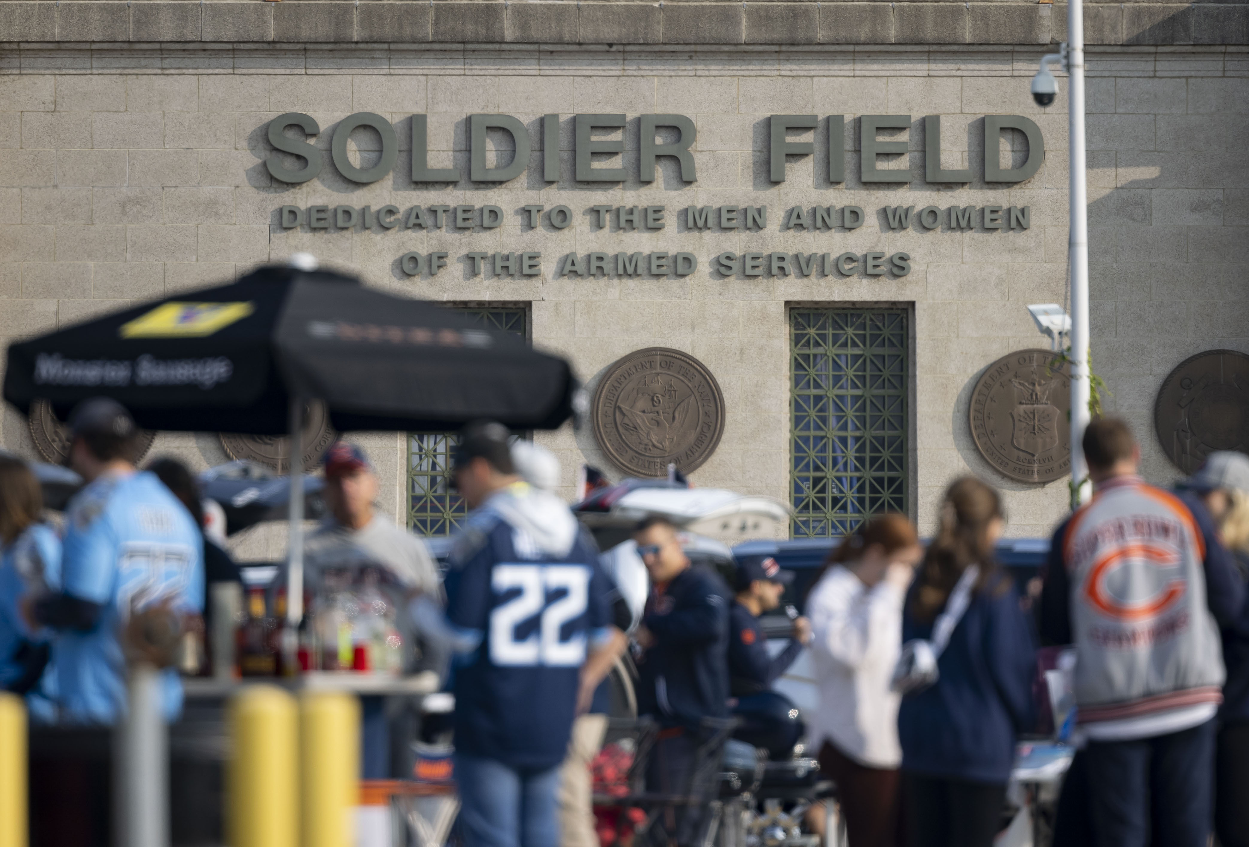 Chicago Bears and Tennessee Titans fans tailgate in the Waldron Deck before the season opener on Sunday, Sept. 8, 2024, at Soldier Field. (Brian Cassella/Chicago Tribune)