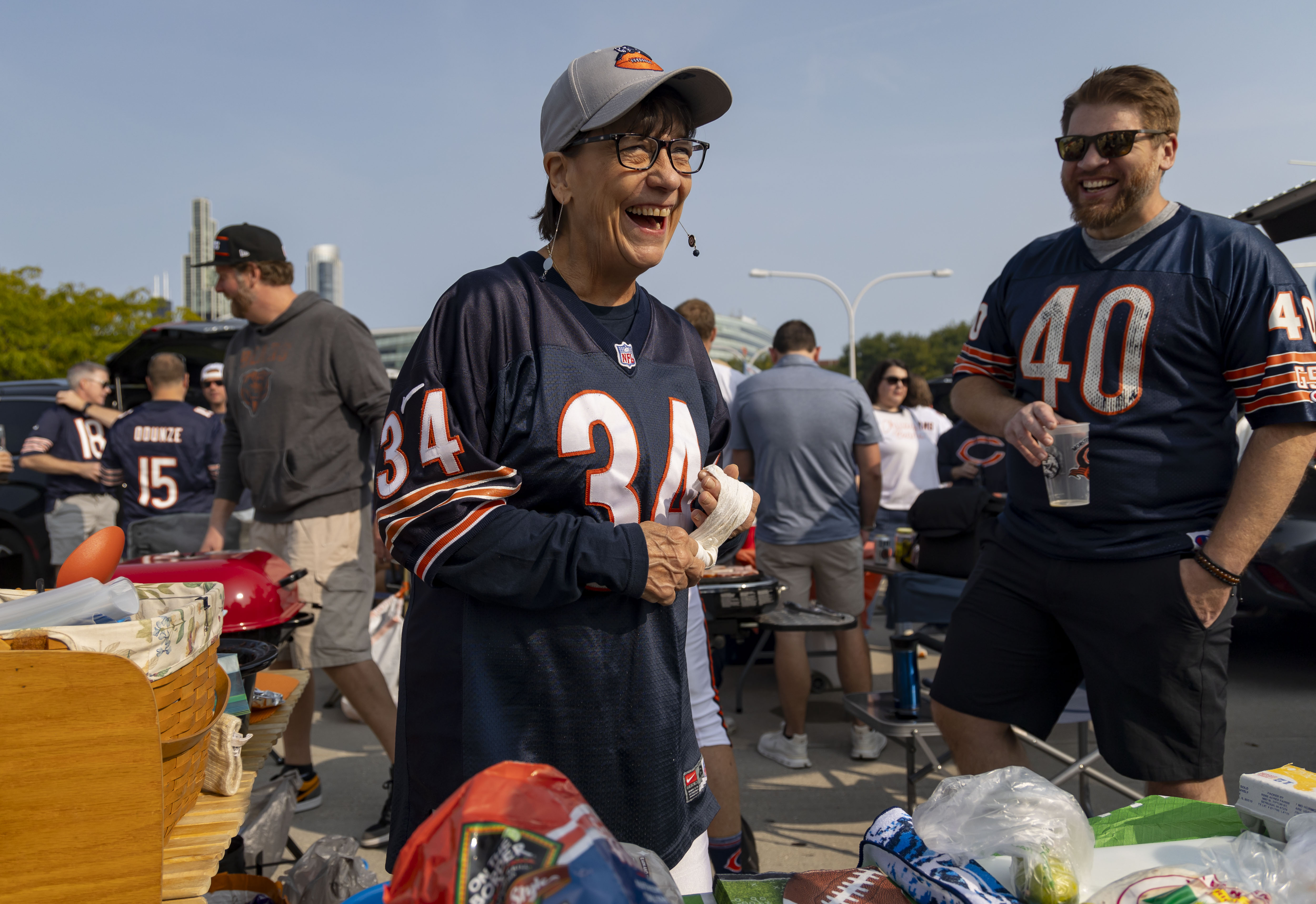 Cindy Laccino and her nephew Steven Fisher tailgate with other family members before the Chicago Bears face the Tennessee Titans in the season opener on Sunday, Sept. 8, 2024, at Soldier Field. (Brian Cassella/Chicago Tribune)