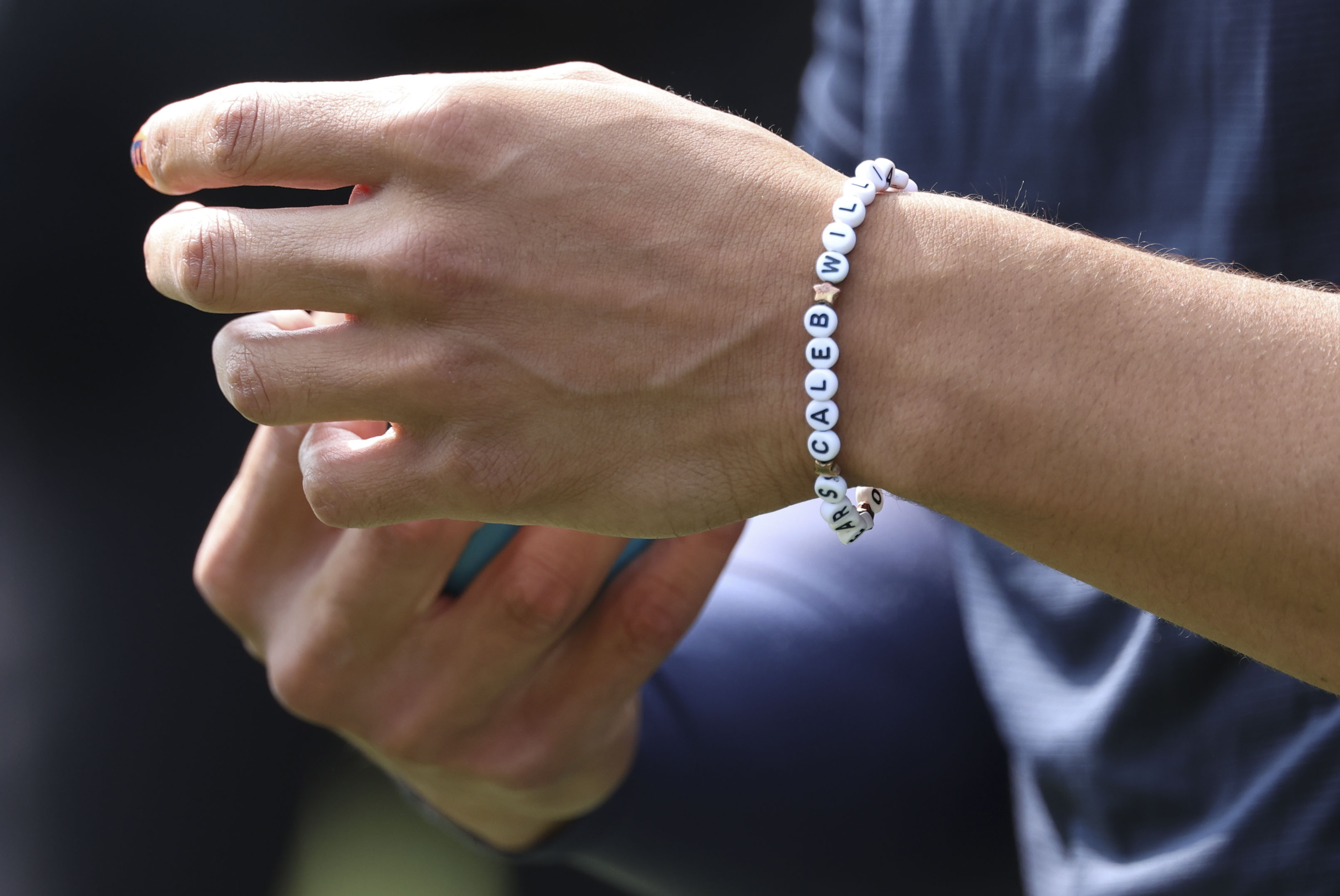 Chicago Bears quarterback Caleb Williams, 18, wears a bracelet while warming up to face the Tennessee Titans on Sunday, Sept. 8, 2024, at Soldier Field. (Brian Cassella/Chicago Tribune)