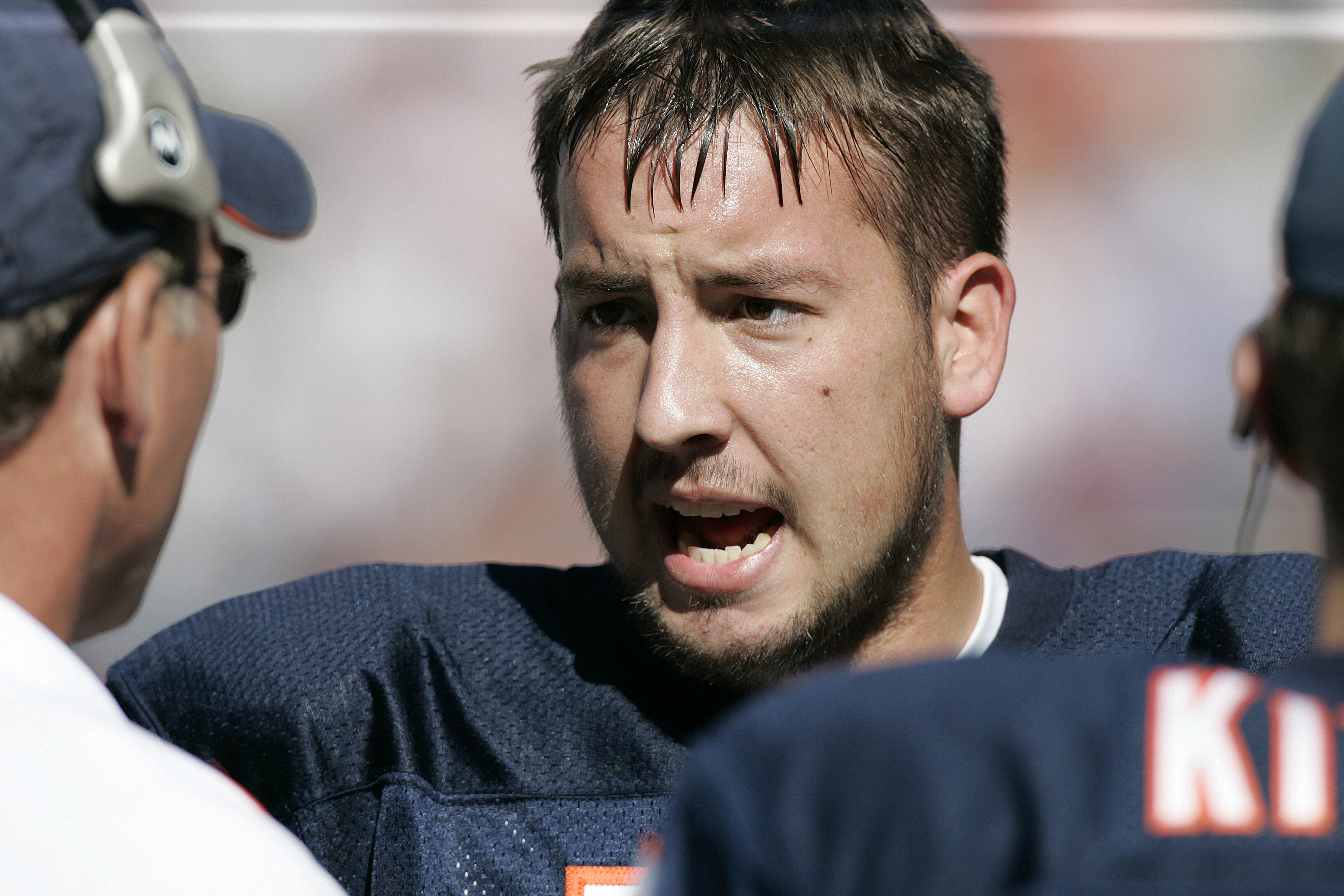 Bears quarterback Kyle Orton talks to coaches on the sideline during a 28-3 victory over the Vikings on Oct. 16, 2005, at Soldier Field. (Jim Prisching/Chicago Tribune)