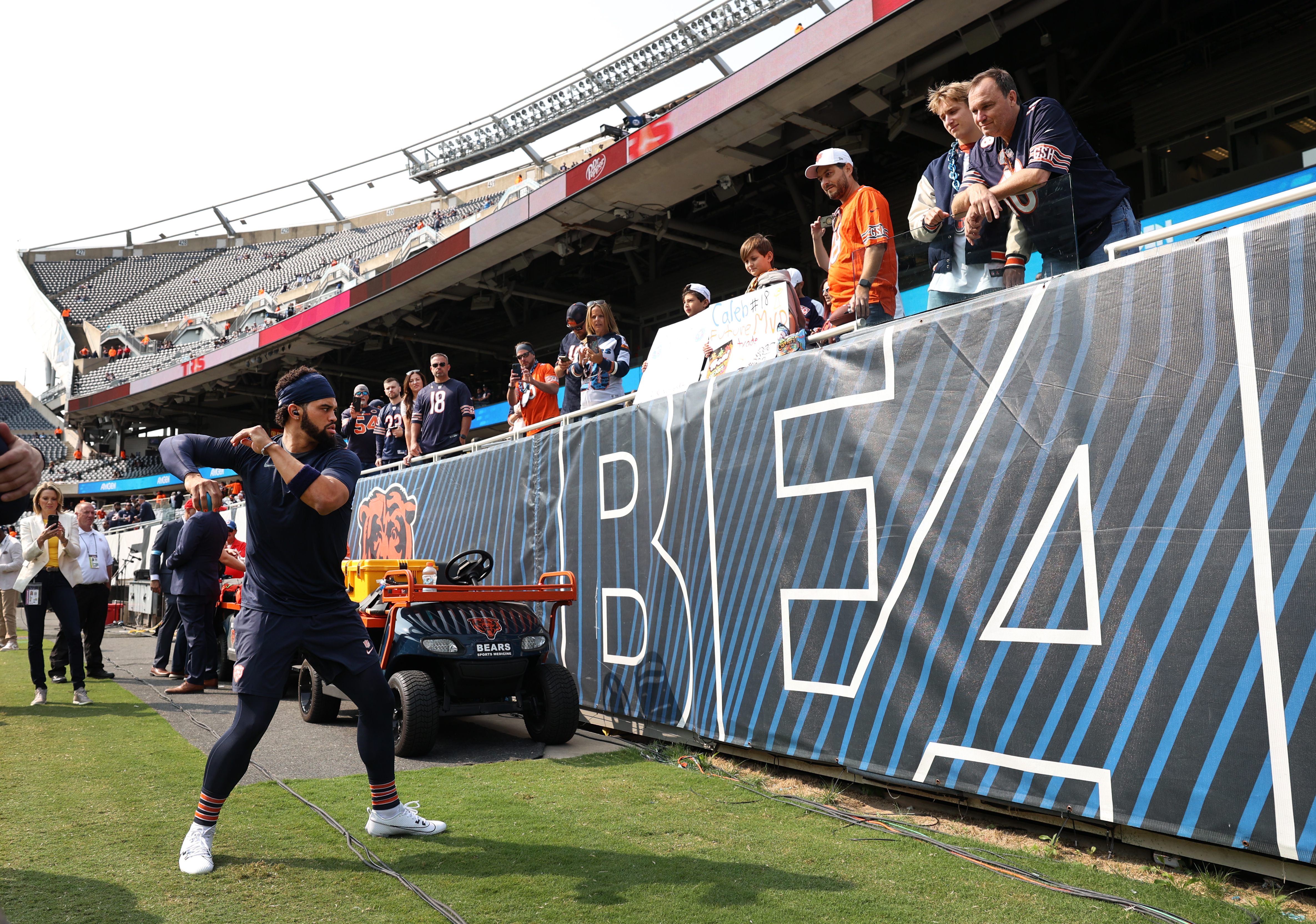 Chicago Bears quarterback Caleb Williams (18) warms up for the season opener against the Tennessee Titans at Soldier Field in Chicago on Sept. 8, 2024. (Chris Sweda/Chicago Tribune)