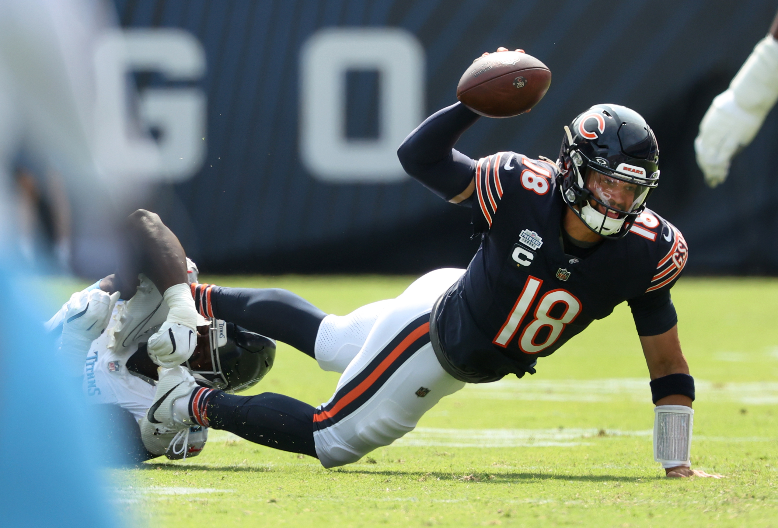 Tennessee Titans defensive tackle Sebastian Joseph-Day, 69, sacks Chicago Bears quarterback Caleb Williams, 18, in the first quarter of a game at Soldier Field in Chicago on Sept. 8, 2024. (Chris Sweda/Chicago Tribune)