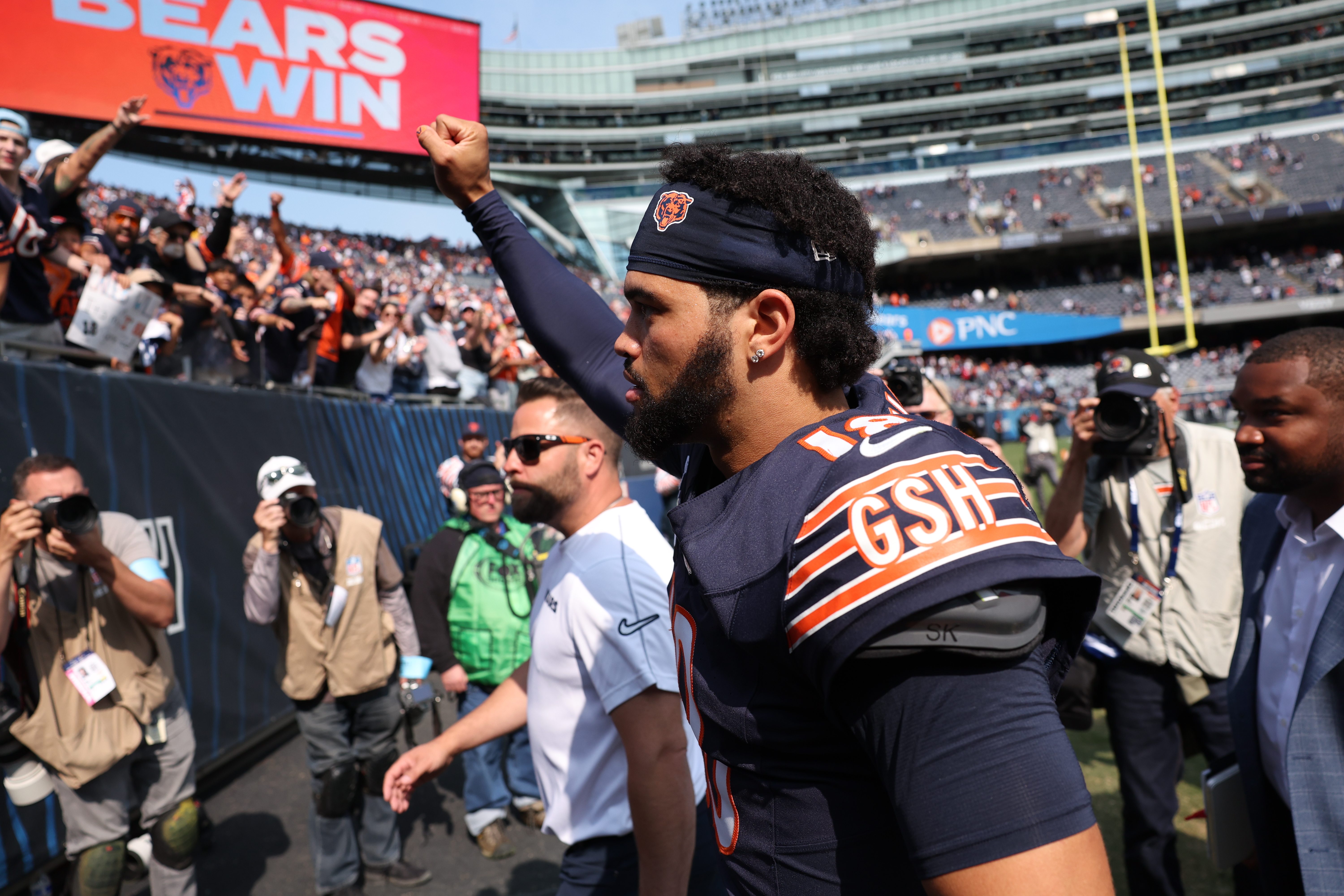 Chicago Bears quarterback Caleb Williams, 18, celebrates while coming off the field after a 24-17 victory over the Tennessee Titans at Soldier Field in Chicago on Sept. 8, 2024. (Chris Sweda/Chicago Tribune)