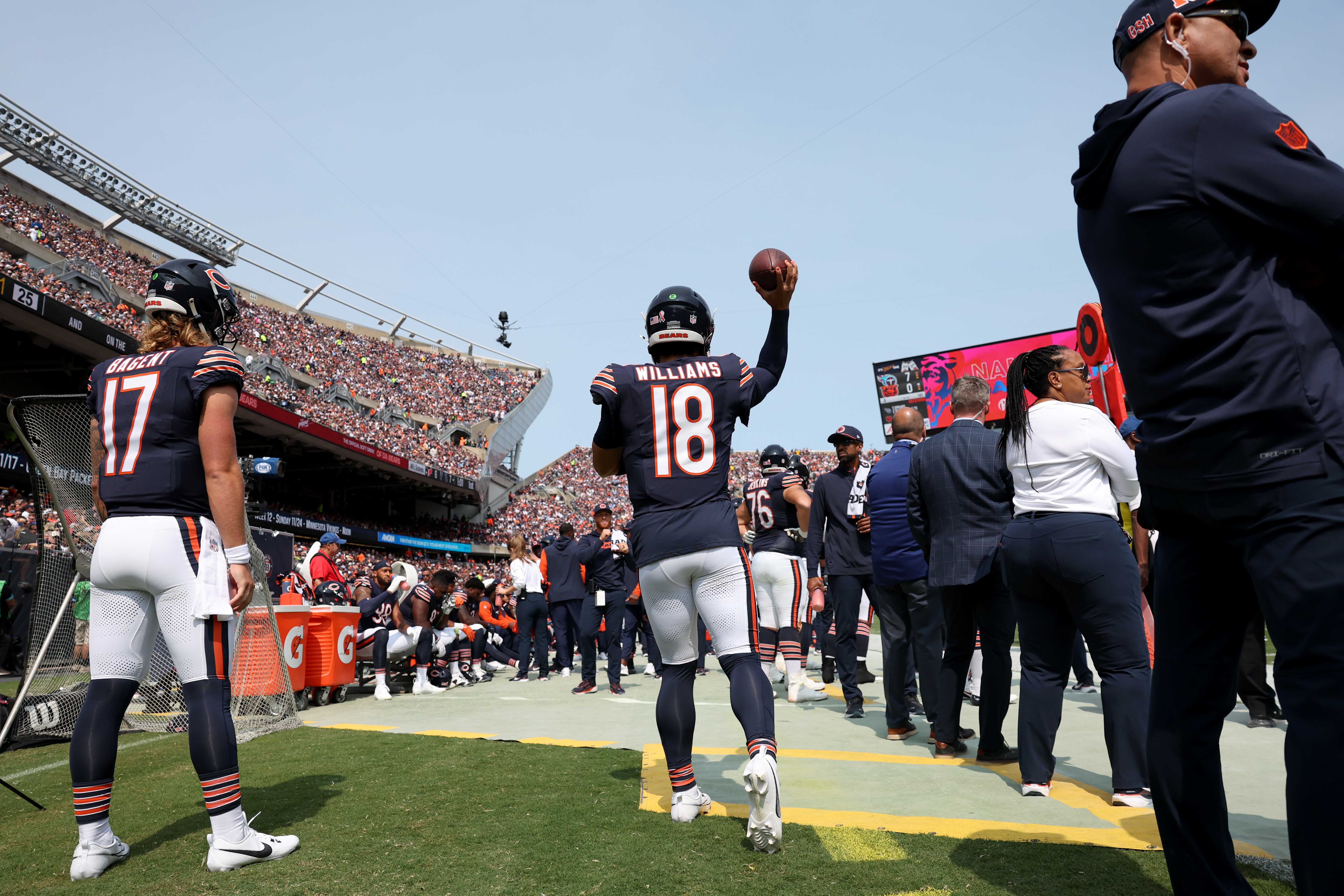 Bears quarterback Caleb Williams warms up on the sideline in the first quarter against the Titans at Soldier Field on Sept. 8, 2024. (Chris Sweda/Chicago Tribune)