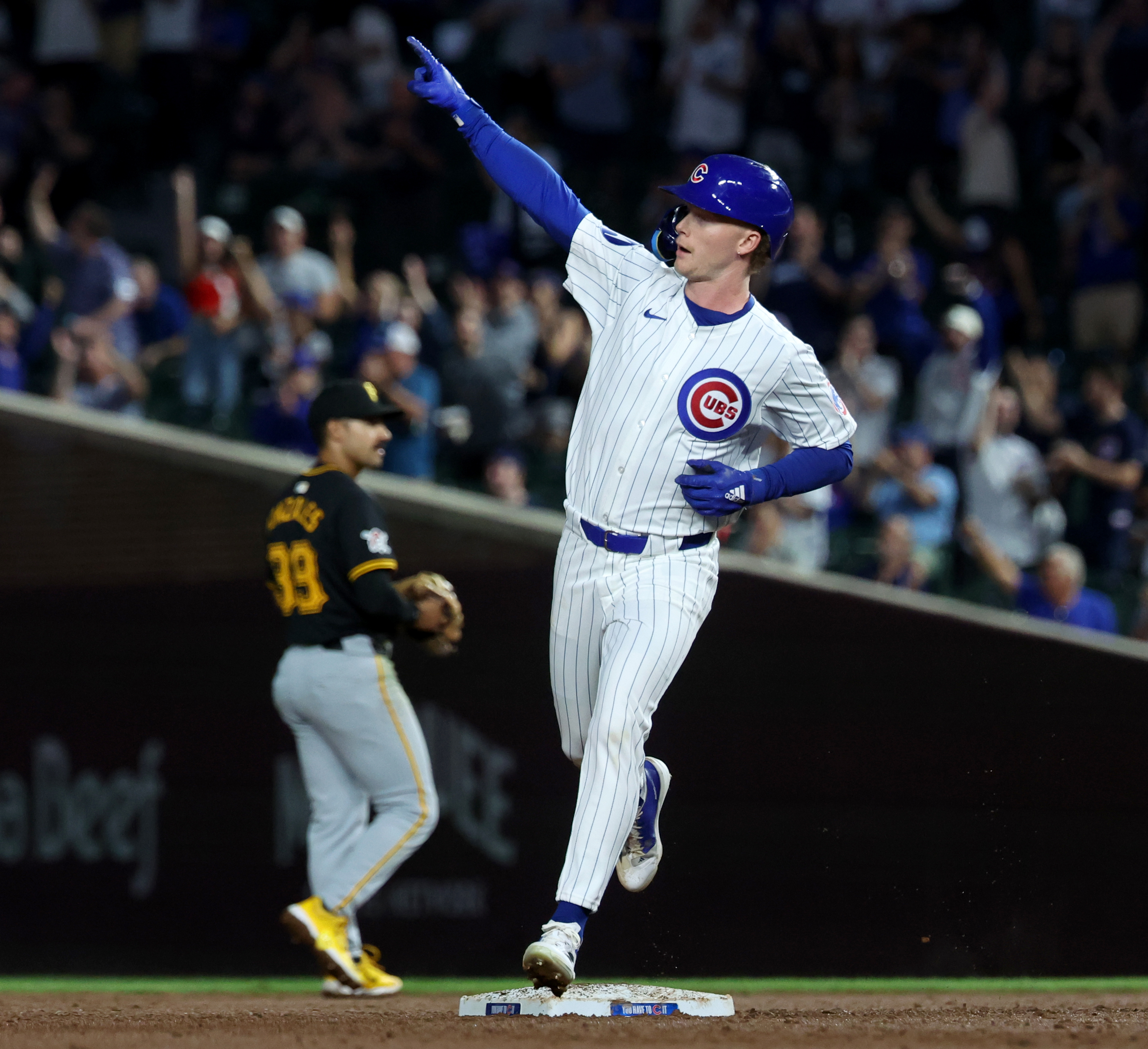 Chicago Cubs center fielder Pete Crow-Armstrong celebrates as he rounds the bases after hitting a solo home run in the third inning of a game against the Pittsburgh Pirates at Wrigley Field in Chicago on Sept. 4, 2024. (Chris Sweda/Chicago Tribune)