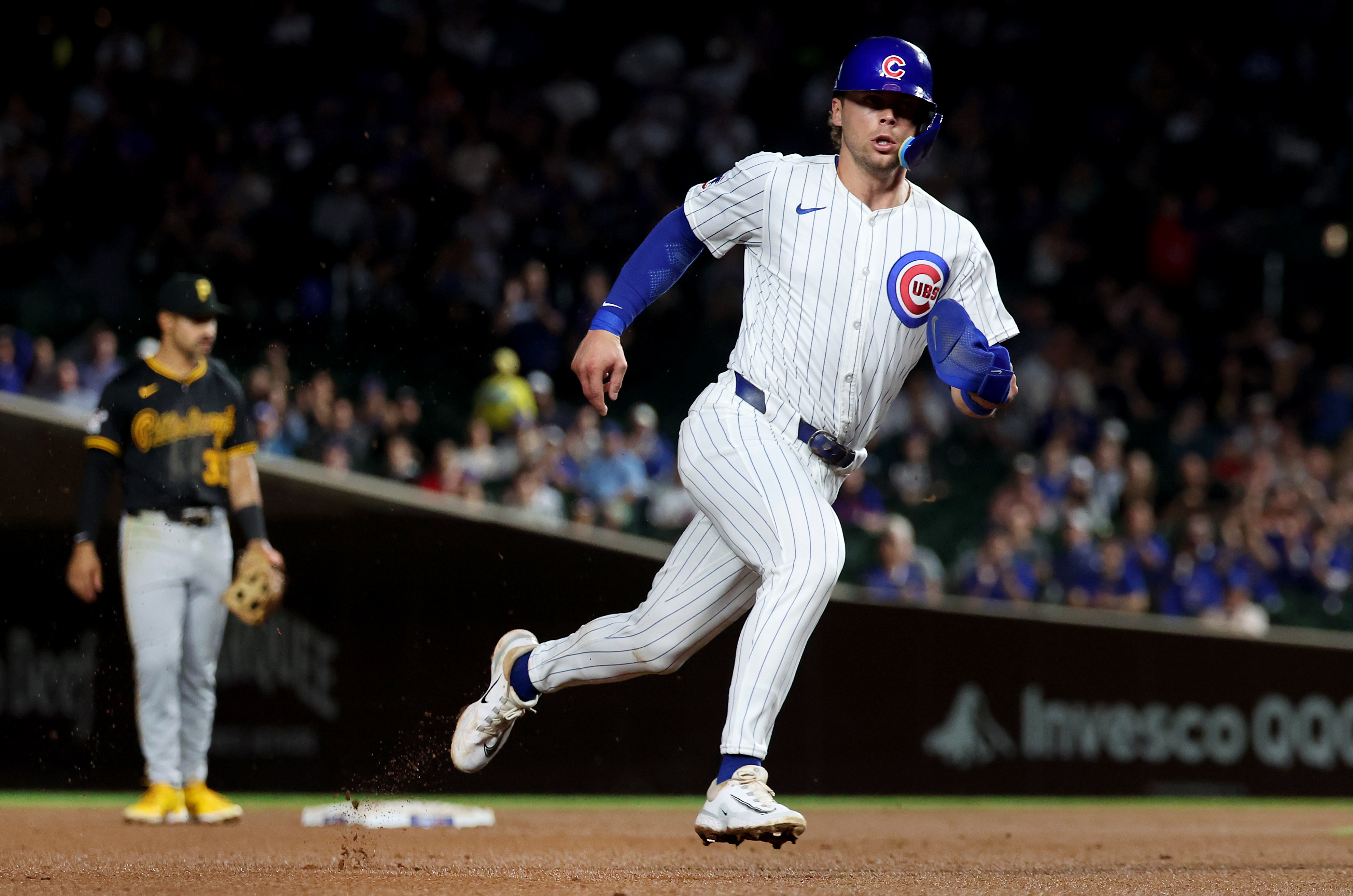 Chicago Cubs second baseman Nico Hoerner advances to third base on a run-scoring double by teammate Dansby Swanson in the fifth inning of a game against the Pittsburgh Pirates at Wrigley Field in Chicago on Sept. 4, 2024. (Chris Sweda/Chicago Tribune)