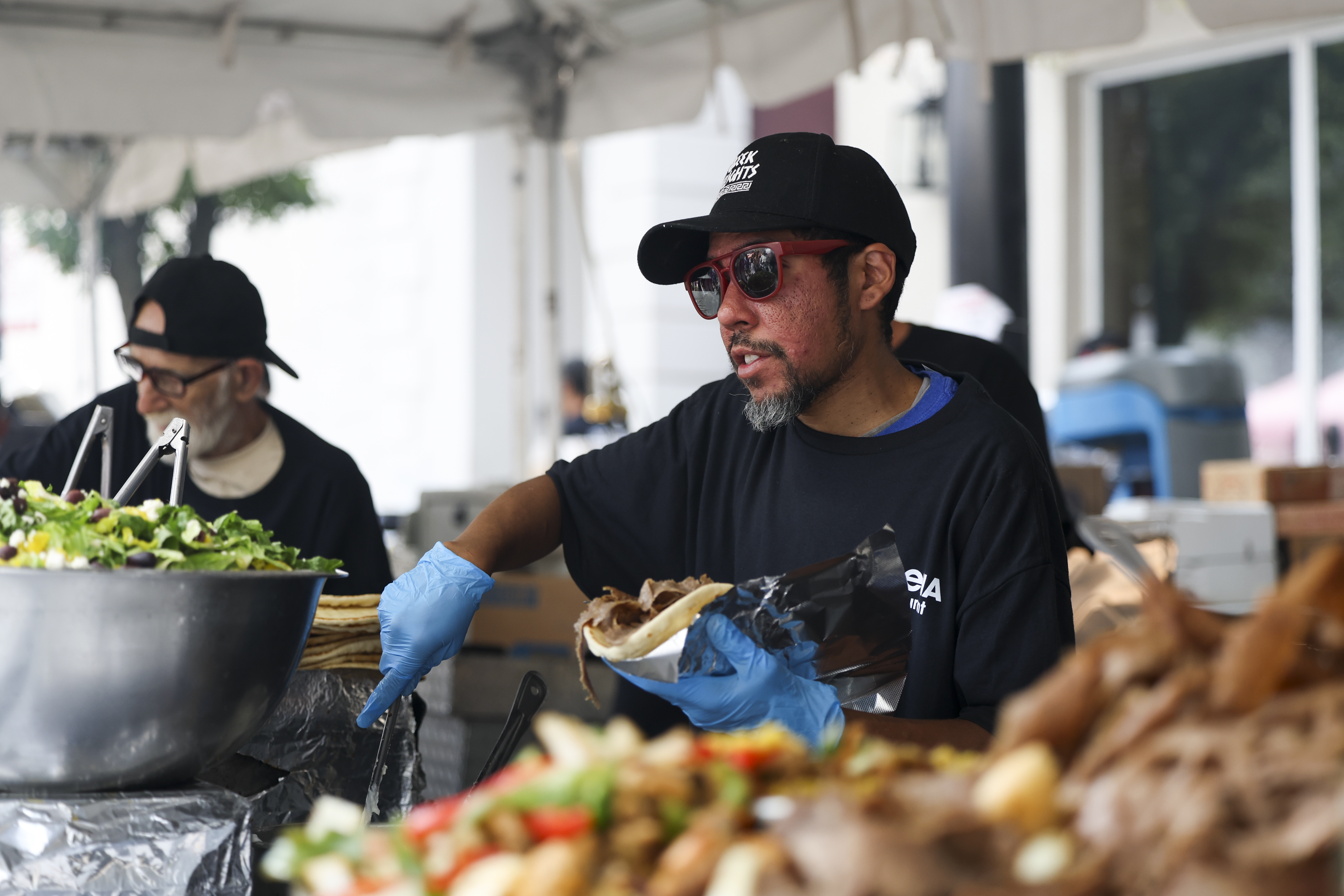 An Athena Restaurant worker prepares a gyro during Taste of Greektown in the Greektown neighborhood on Sunday, Sept. 8, 2024. (Eileen T. Meslar/Chicago Tribune)