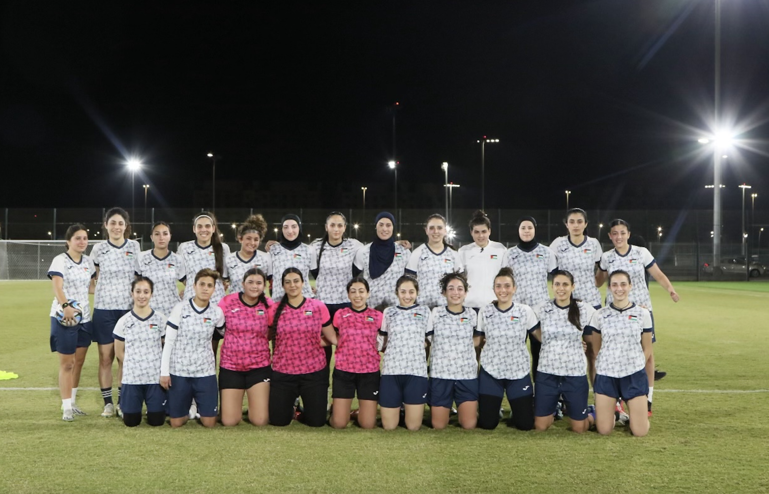 Members of the Palestinian National Soccer Team pose for a team photo during the West Asian Women's Football Championship earlier this year. (Guevara Al-Sheikh)