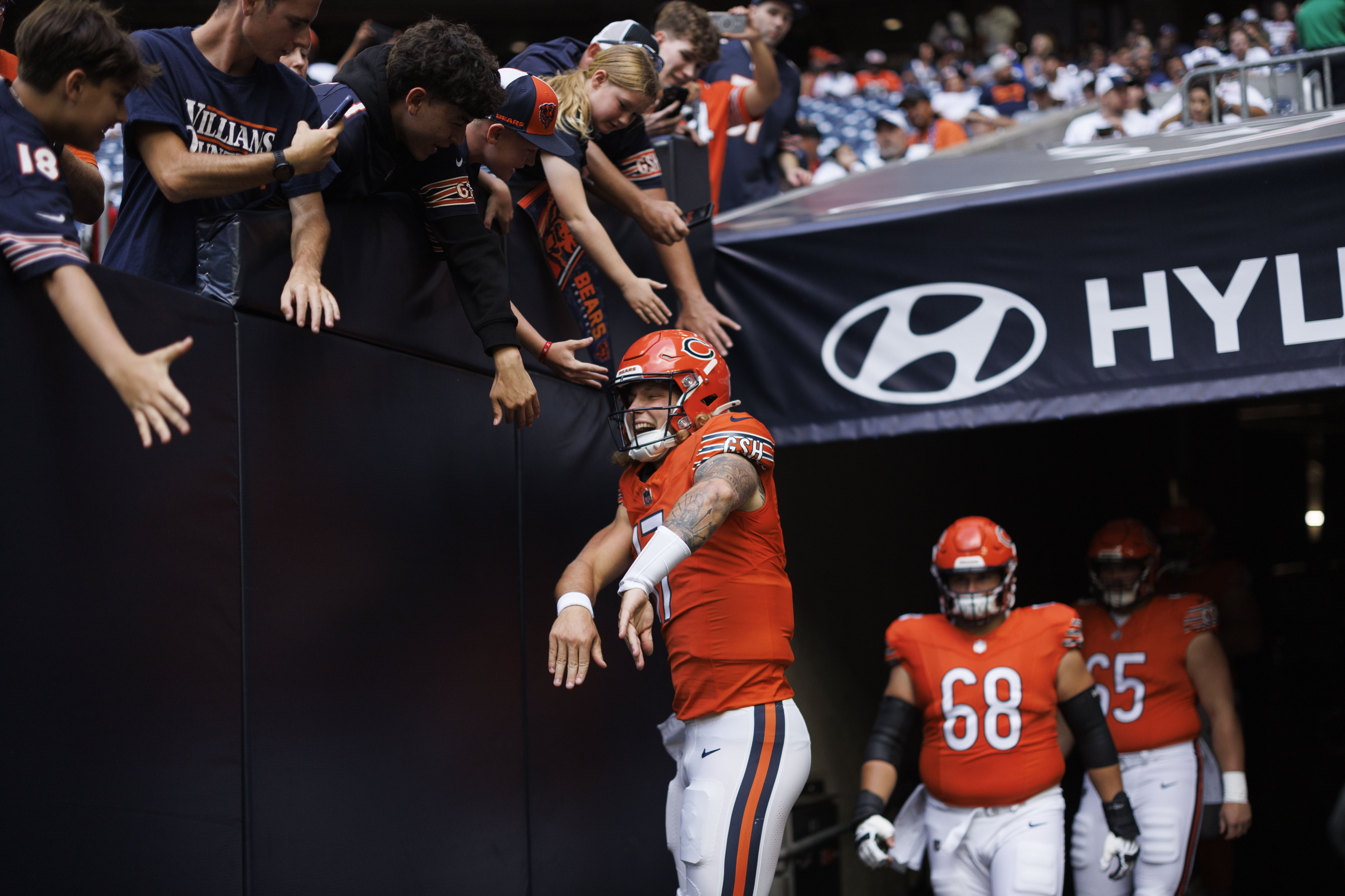 Chicago Bears quarterback Tyson Bagent (17) high-fives fans before the Bears play the Houston Texans at NRG Stadium on Sunday, Sept. 15, 2024, in Houston. (Armando L. Sanchez/Chicago Tribune)