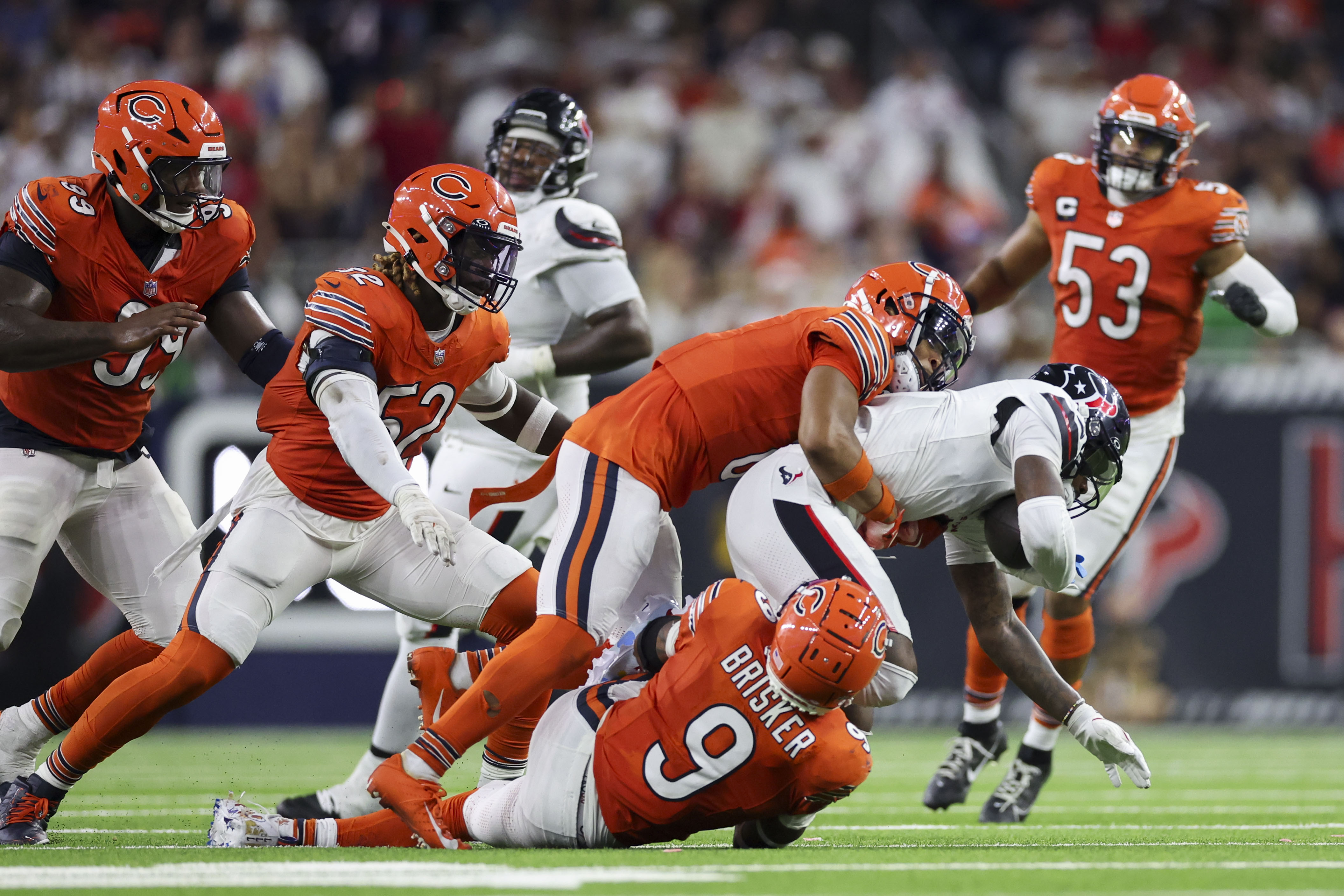 Chicago Bears cornerback Kyler Gordon (6) and Chicago Bears safety Jaquan Brisker (9) tackle Houston Texans wide receiver Stefon Diggs (1) during the fourth quarter at NRG Stadium Sunday Sept. 15, 2024, in Houston. (Armando L. Sanchez/Chicago Tribune)