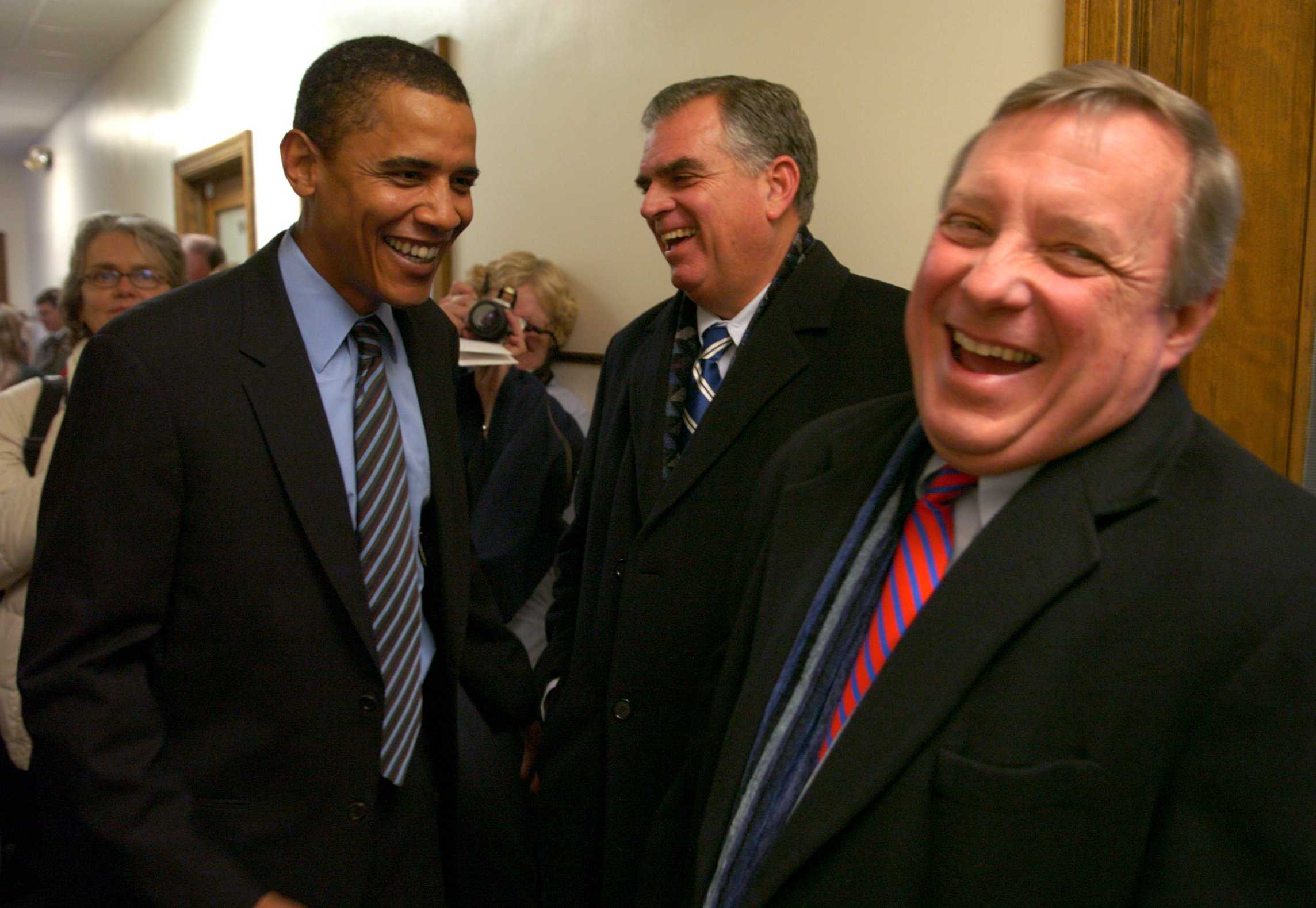 Arriving at his new office in Springfield, U.S. Sen. Barack Obama, left, laughs with U.S. Rep. Ray LaHood, center, and fellow U.S. Sen. Dick Durbin, on Jan. 10, 2005. (Pete Souza/Chicago Tribune)