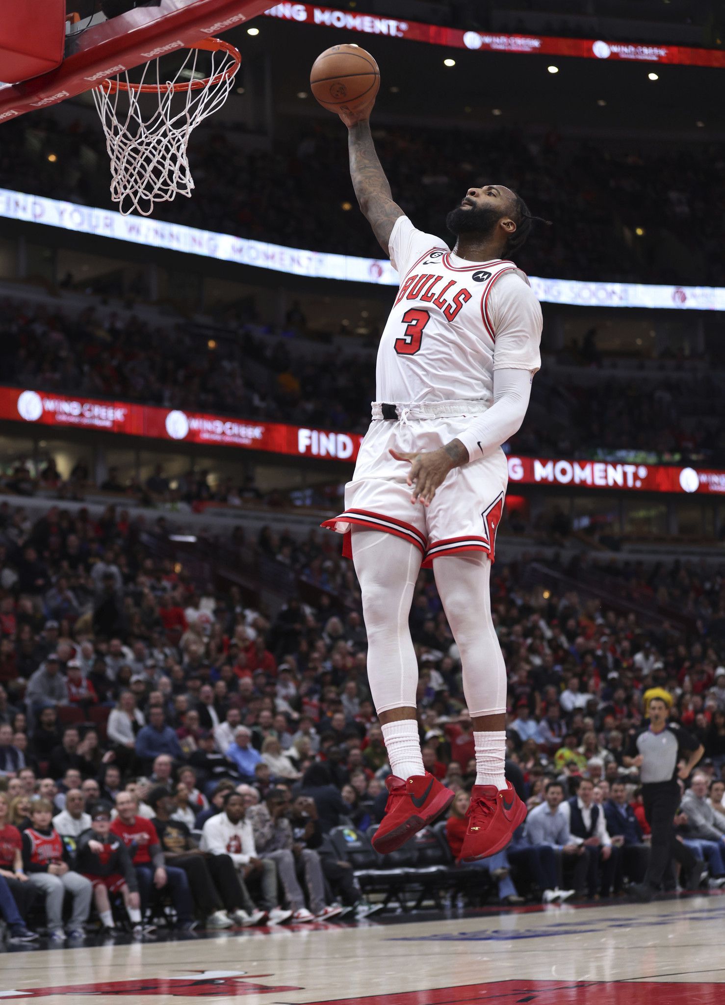Bulls center Andre Drummond dunks the ball off a fast break in the first half of a game against the Kings at the United Center on March 15, 2023. (Chris Sweda/TNS/Chicago Tribune)
