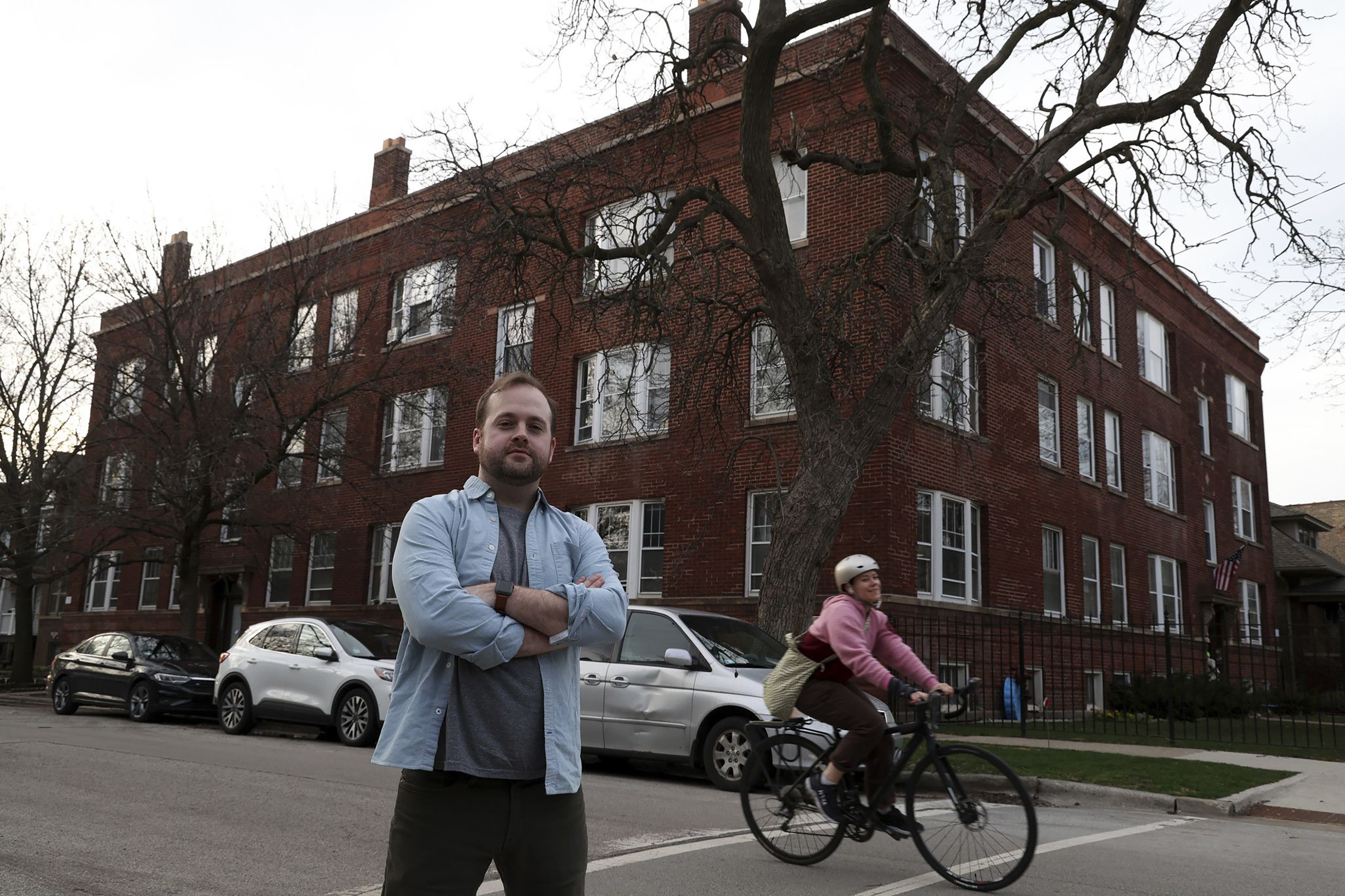 Alex Hardaway, who wrote a song about all of his neighbors in his 15-unit apartment building during the depths of the COVID-19 pandemic, is seen outside his Andersonville home on April 5, 2023. (Terrence Antonio James/Chicago Tribune/TNS)