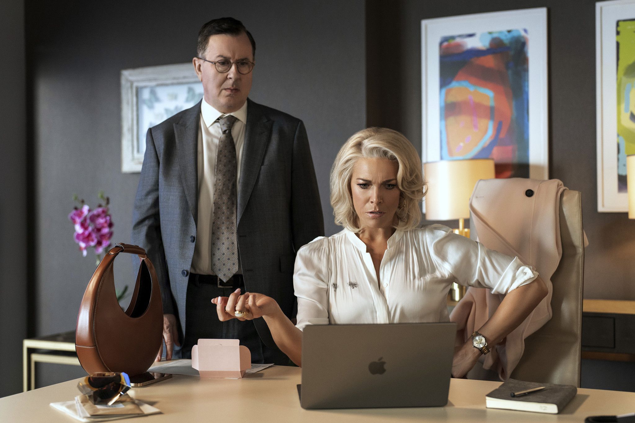 From left: Jeremy Swift and Hannah Waddingham in "Ted Lasso." (Colin Hutton/Apple TV+)