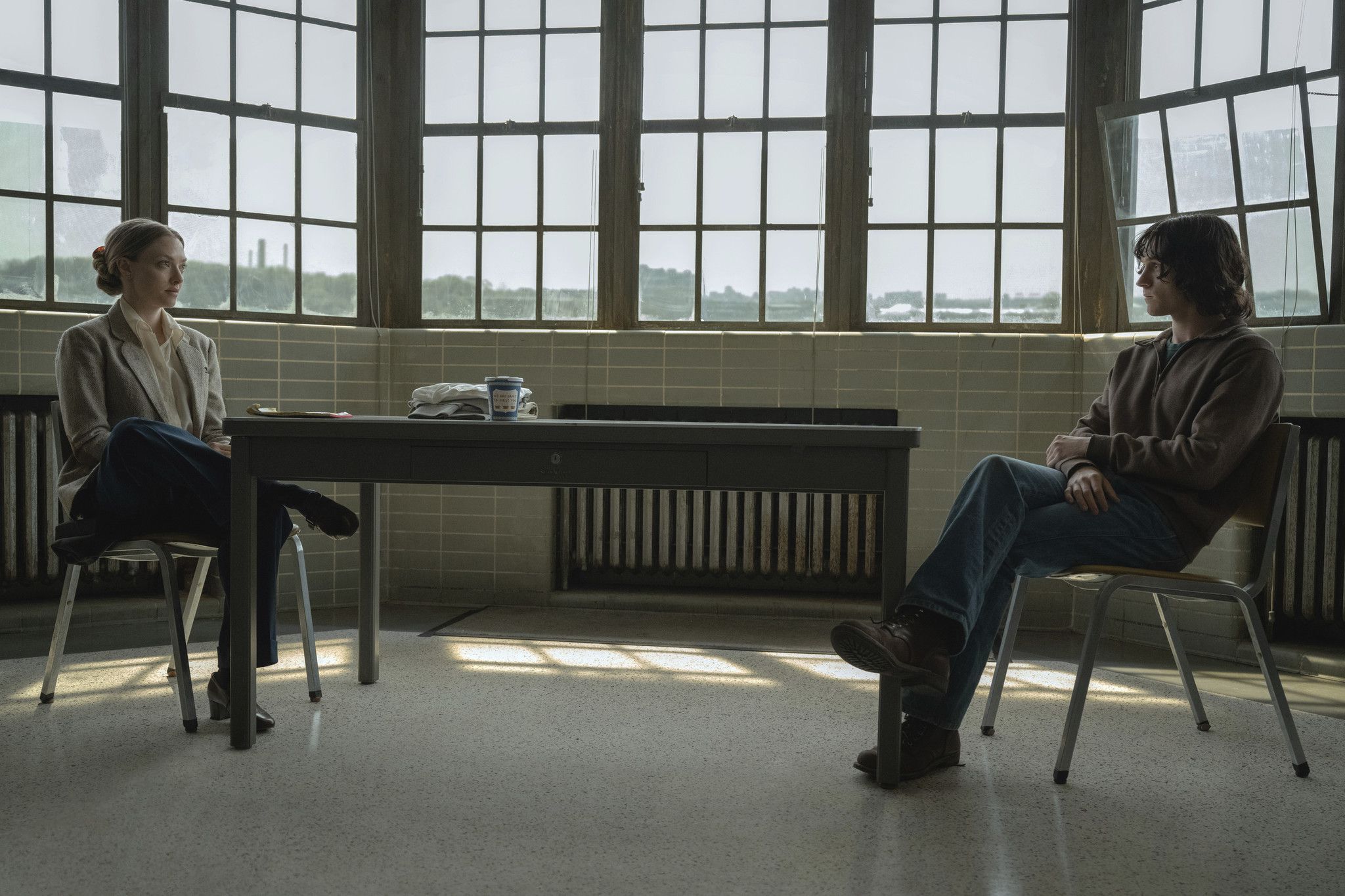 From left: Amanda Seyfried and Tom Holland in "The Crowded Room.
