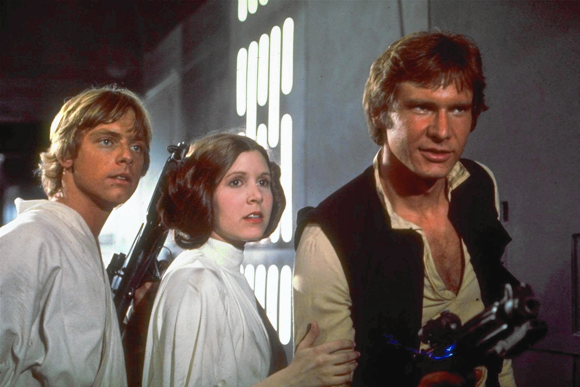 Mark Hamill, from left, Carrie Fisher and Harrison Ford starred in the 1977 film "Star Wars."