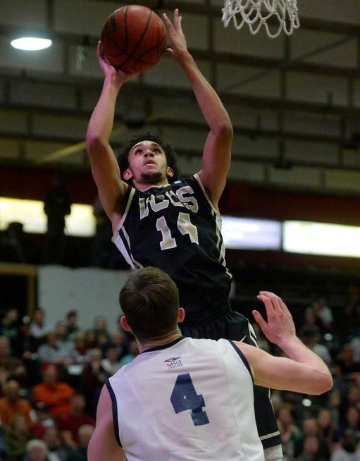 University of Colorado at Colorado Springs junior guard Derrick White, 14, shoots over Metropolitan State University of Denver's Nicholas Kay, 4, in the second half at Metro State on February 27, 2015. (Photo by Andy Cross/The Denver Post)