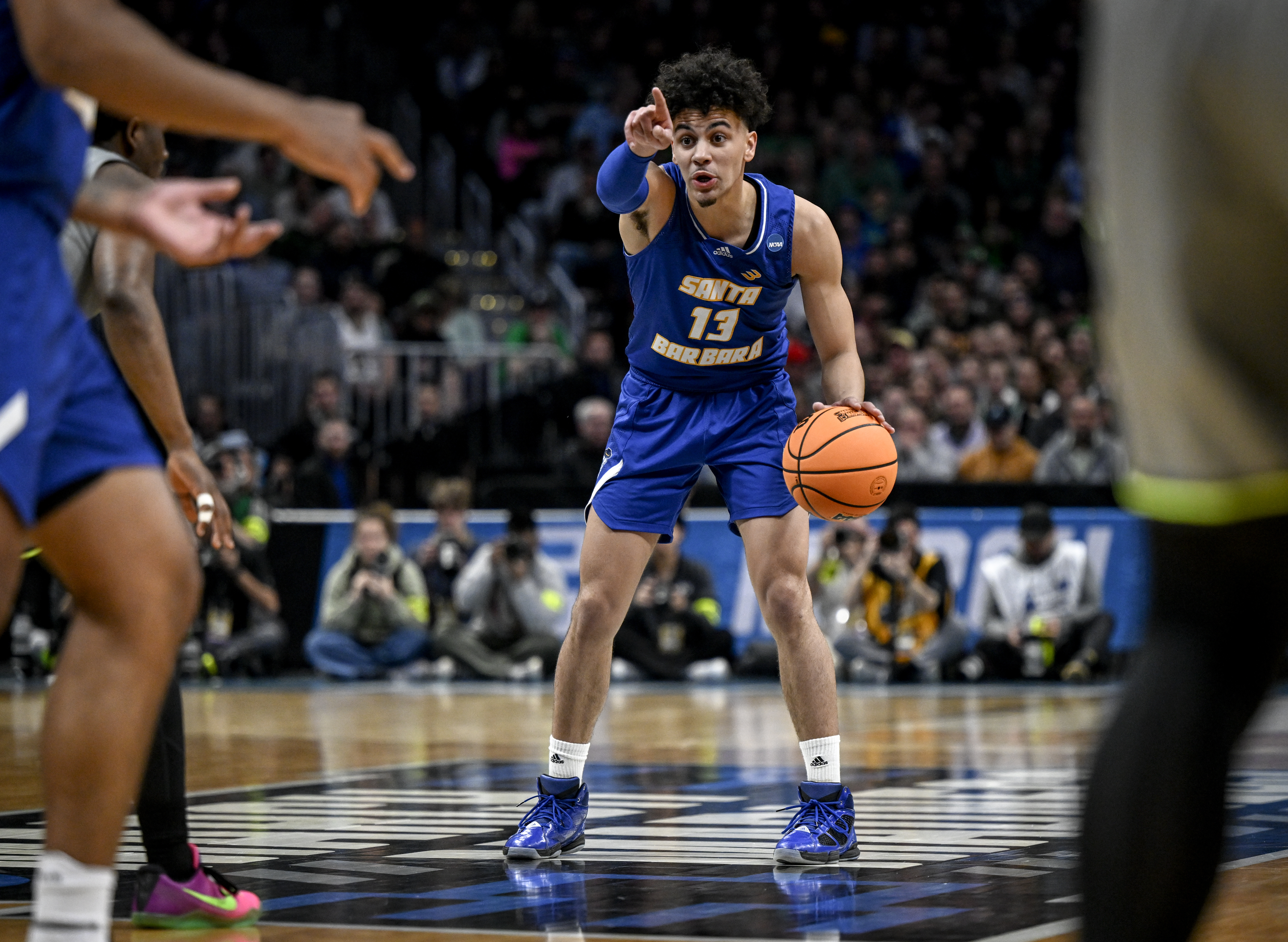 Ajay Mitchell (13) of the UC Santa Barbara Gauchos runs the offense against the Baylor Bears during the first half of their first round NCAA men's basketball tournament game at Ball Arena in Denver on Friday, March 17, 2023. (Photo by AAron Ontiveroz/The Denver Post)