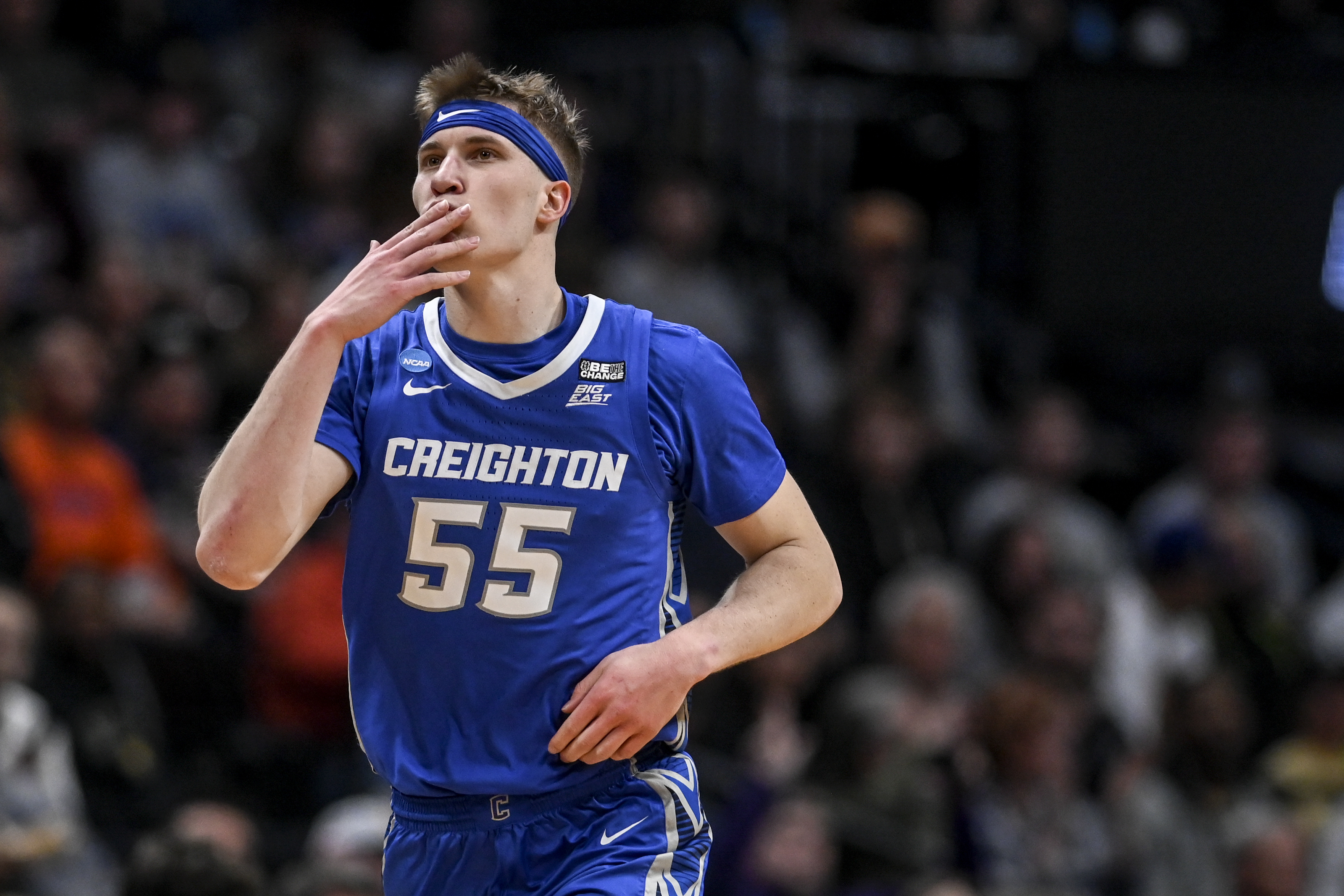Baylor Scheierman (55) of the Creighton Bluejays celebrates a three against the Baylor Bears during the first half of their second round NCAA men's basketball tournament game at Ball Arena in Denver on Sunday, March 19, 2023. (Photo by AAron Ontiveroz/The Denver Post)