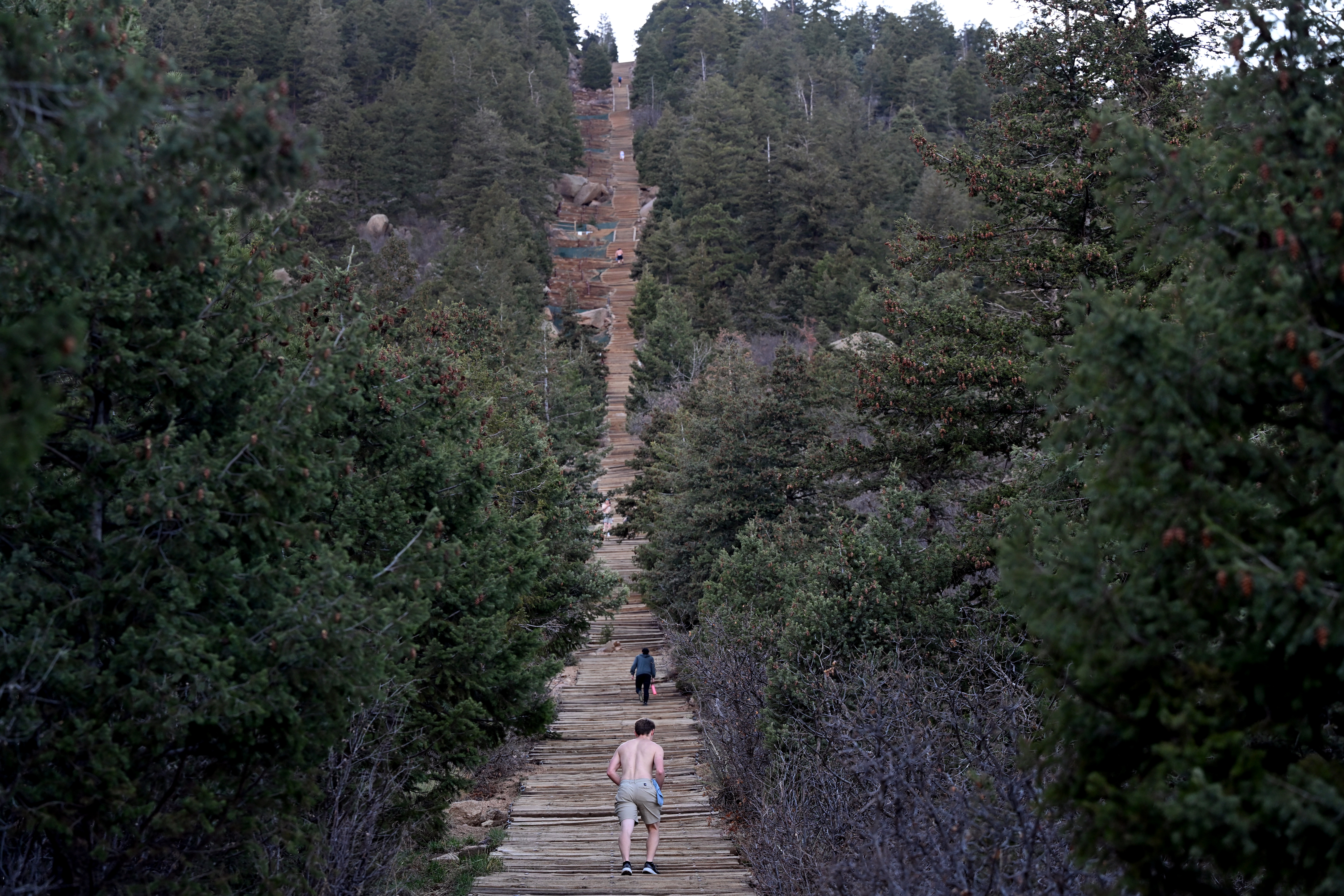 Hikers make their way up the steep steps of the Manitou Incline in Manitou Springs on April 23, 2024. (Photo by Helen H. Richardson/The Denver Post)