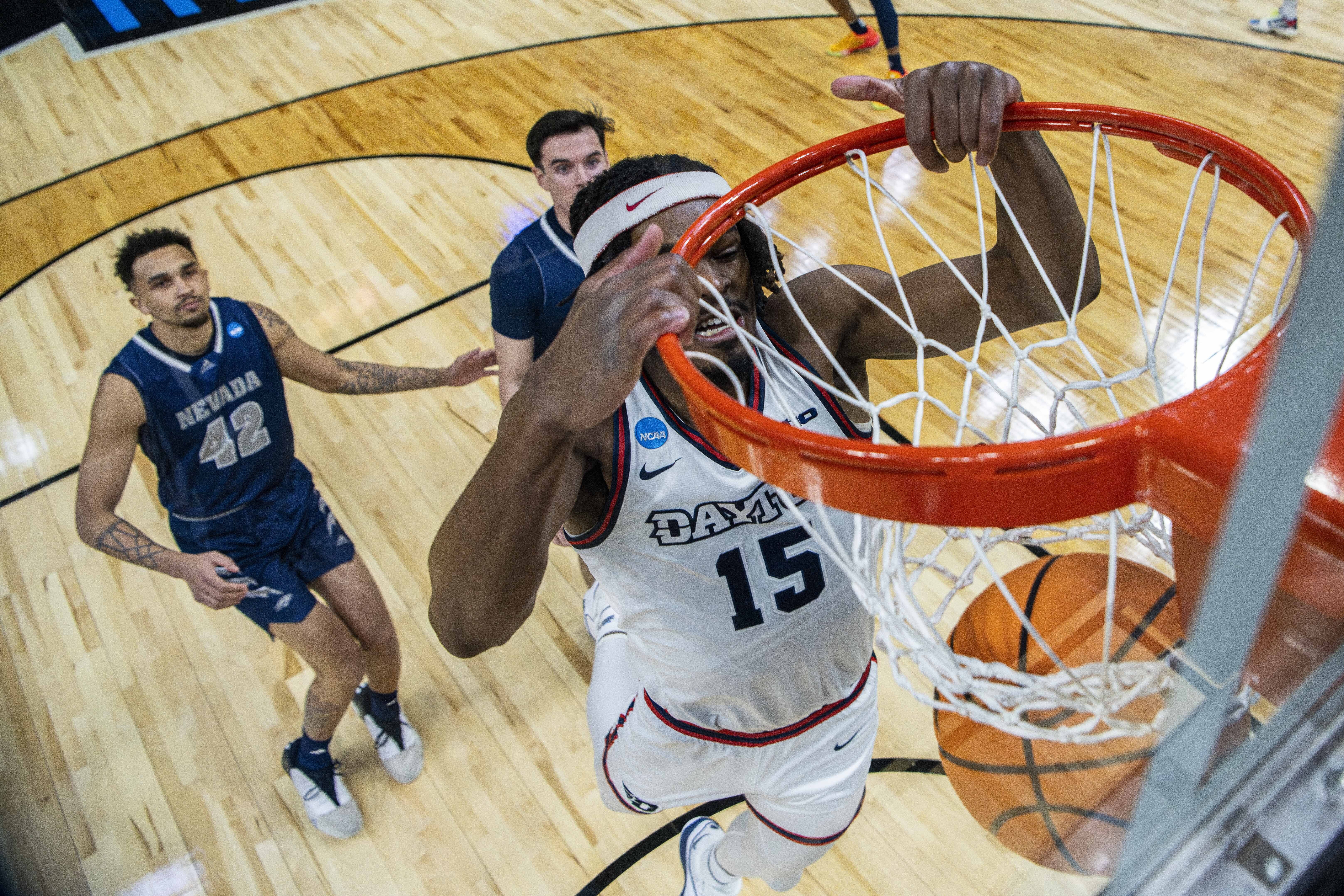 Dayton forward DaRon Holmes II (15) dunks against Nevada during the second half of a first-round college basketball game in the NCAA Tournament in Salt Lake City, Thursday, March 21, 2024. (AP Photo/Isaac Hale)