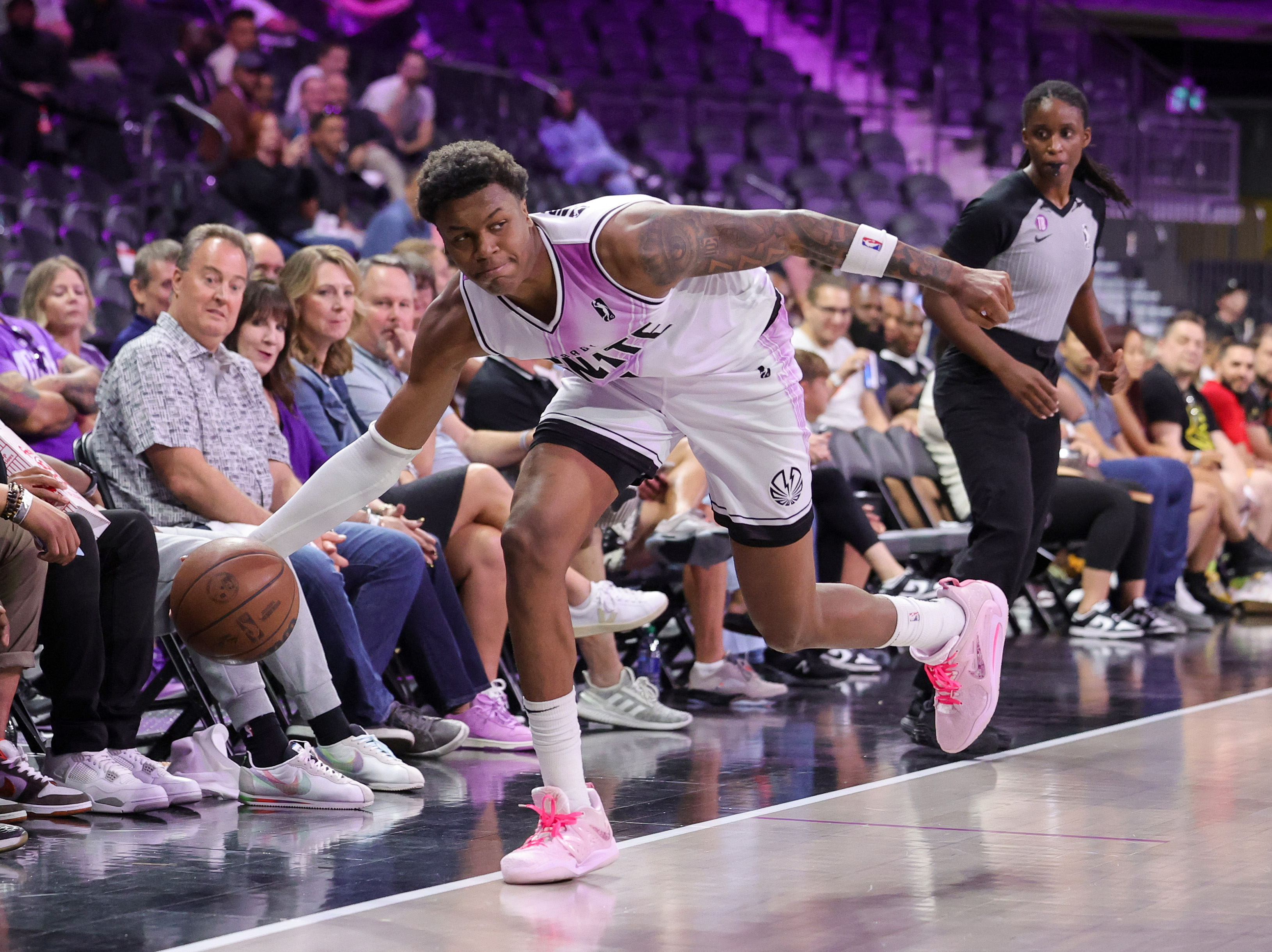 Tyler Smith of G League Ignite saves the ball from going out of bounds in the second half of an NBA G League Fall Invitational game against the Perth Wildcats on Sept. 6, 2023 in Henderson, Nev. Ignite defeated the Wildcats 124-105. (Ethan Miller, Getty Images)