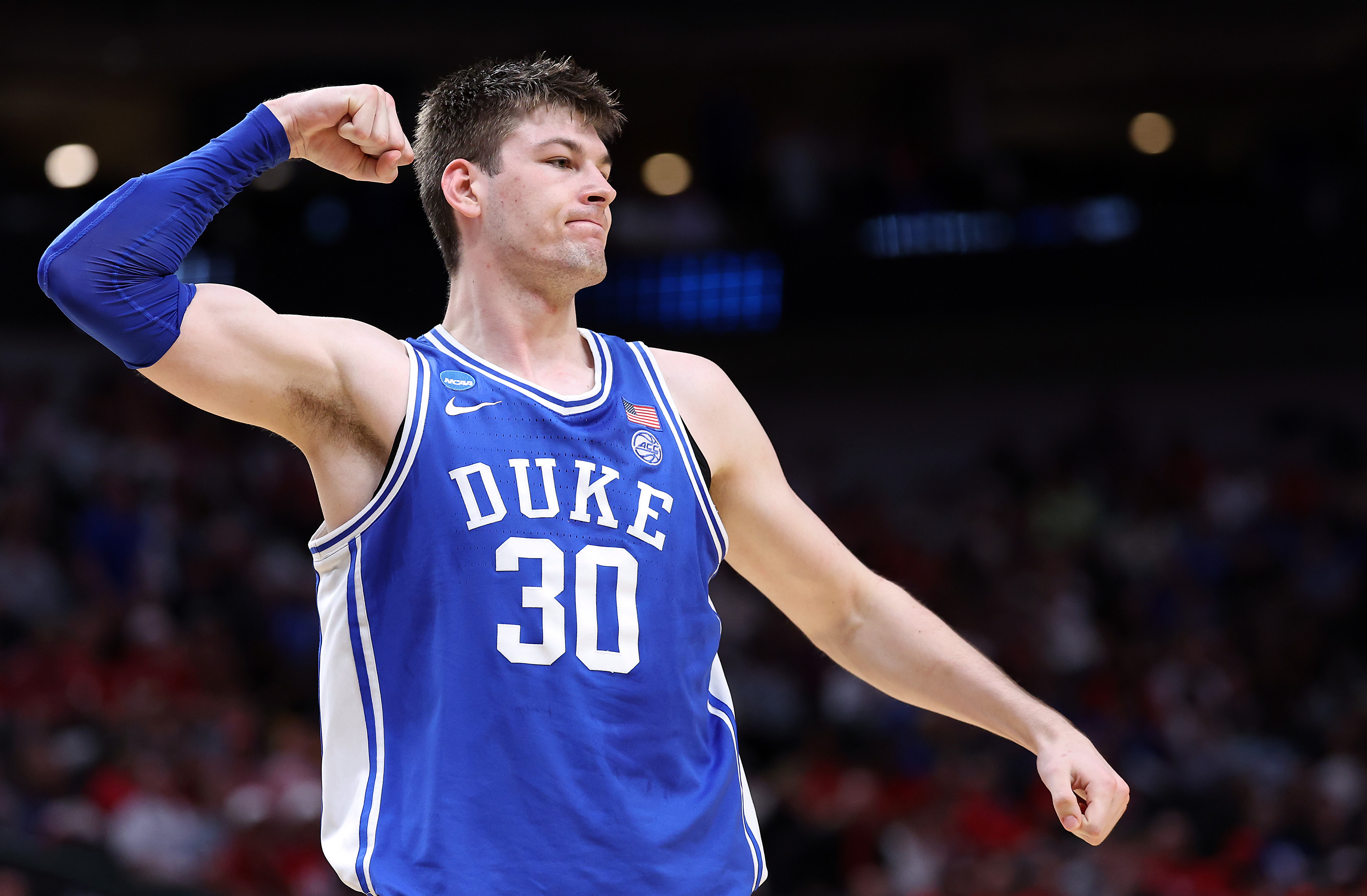 Kyle Filipowski of the Duke Blue Devils reacts after scoring during the second half of the Sweet 16 round of the NCAA Men's Basketball Tournament against the Houston Cougars at American Airlines Center on March 29, 2024 in Dallas, Texas. (Patrick Smith, Getty Images)