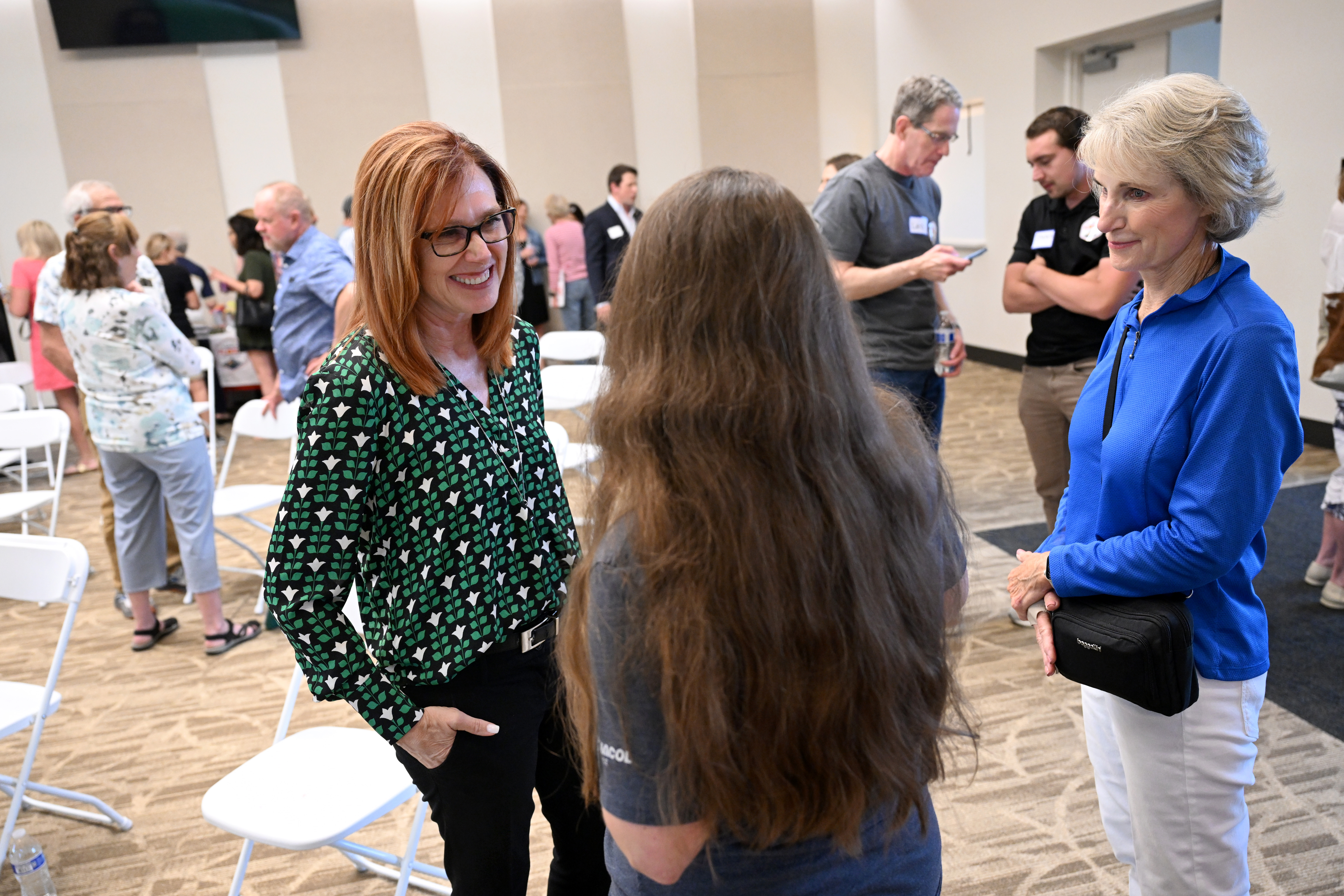 Deborah Flora, a Republican candidate in the 4th Congressional District, talks with supporters after speaking at a meet and greet event in Parker on June 3, 2024. (Photo by Helen H. Richardson/The Denver Post)