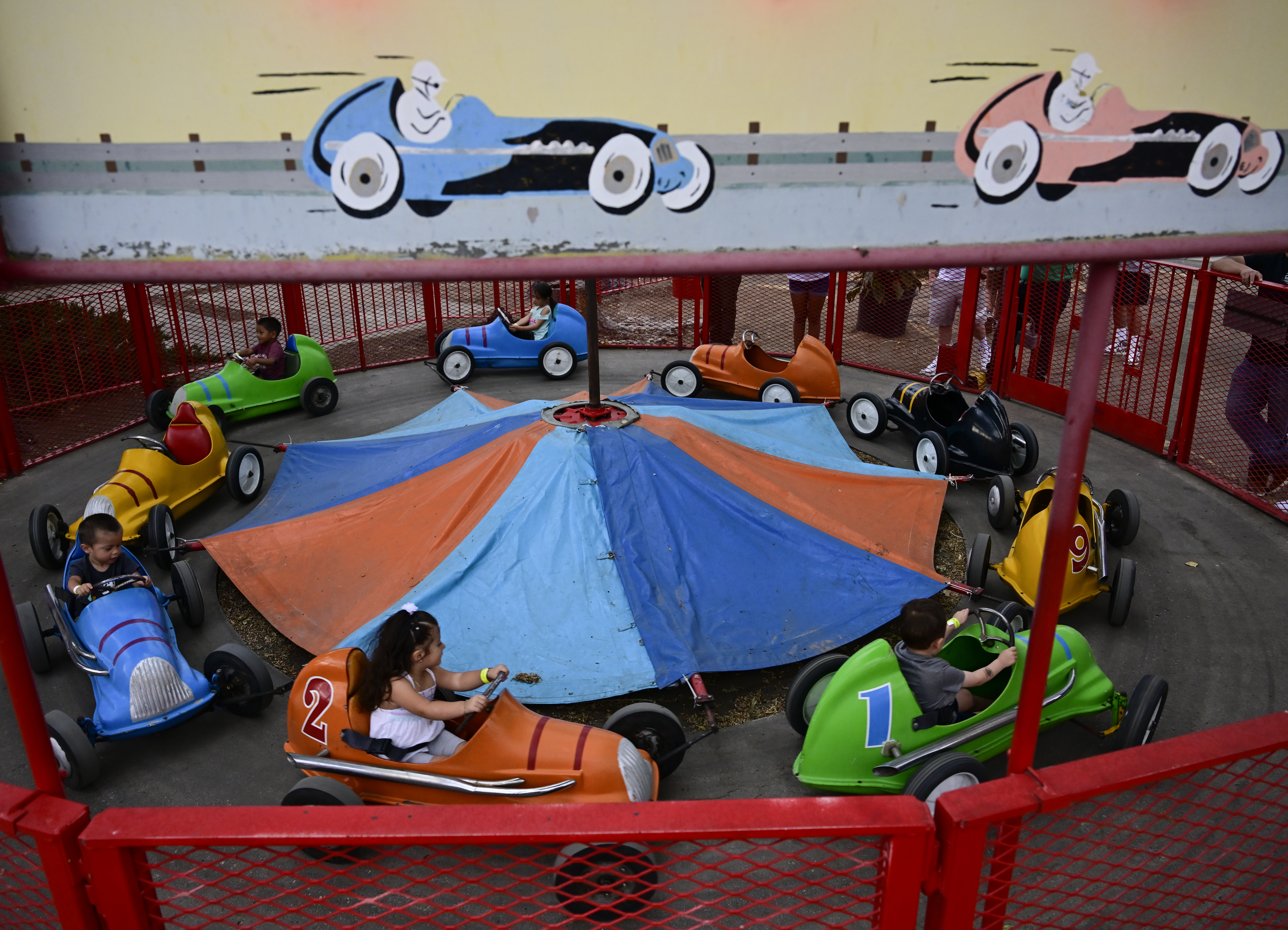 Youngsters enjoy the Midge-O-Racer ride at the Lakeside Amusement Park in Lakeside, Colorado Thursday, June 27, 2024. (Photo by Andy Cross/The Denver Post)