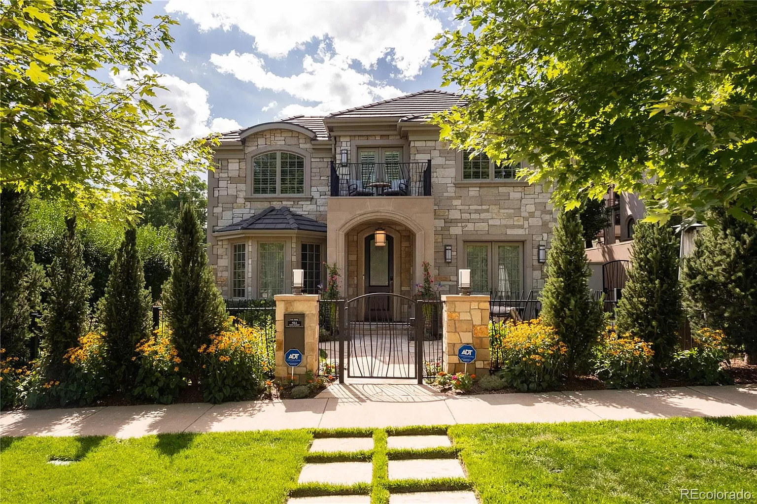 This Cook St. home includes four bedrooms, seven baths, and a three-car garage. (Courtesy REColorado via BusinessDen)