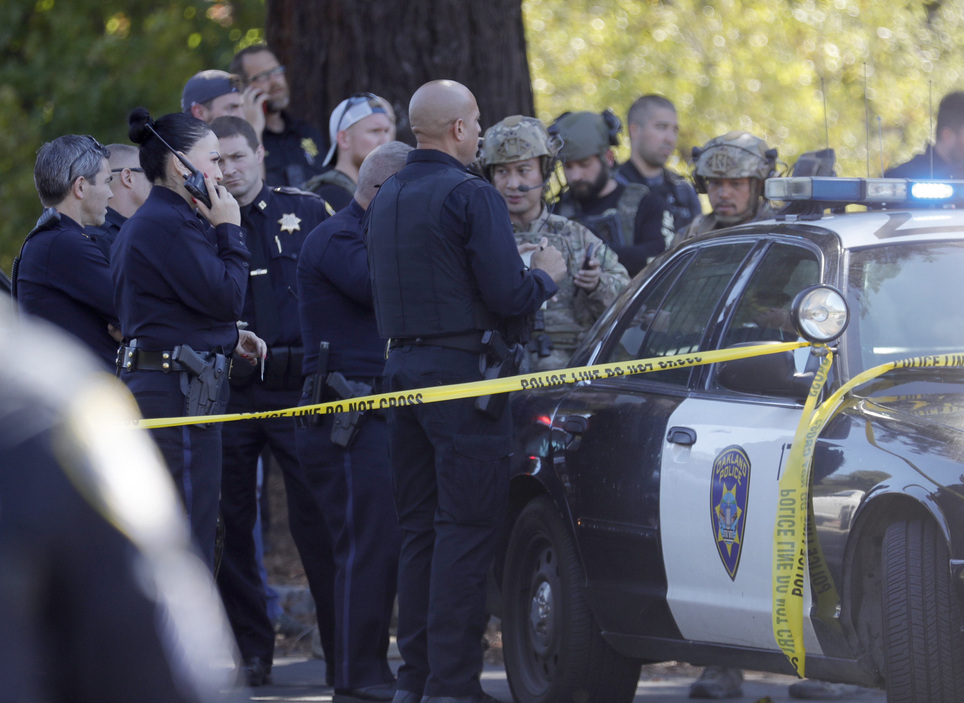OAKLAND, CALIFORNIA - SEPTEMBER 28: Law enforcement officers from several agencies respond after at least six adults were shot at the Bay Area Technology School complex in East Oakland, Calif., on Wednesday, Sept. 28, 2022. (Jane Tyska/Bay Area News Group)