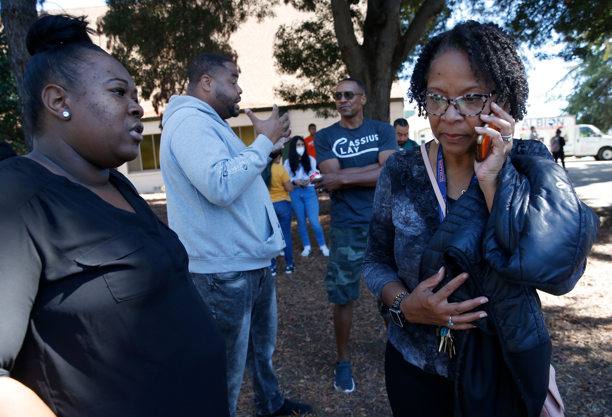 OAKLAND, CALIFORNIA SEPTEMBER 28: Parent Brandi Roberts waits to find out news about her daughter from Dr. Lori Smith as students gather at St. Cuthbert's Episcopal Church on Mountain Boulevard and Keller Avenue as law enforcement officers from several agencies respond after at least six adults were shot at the Bay Area Technology School complex in East Oakland, Calif., on Wednesday, Sept. 28, 2022. (Jane Tyska/Bay Area News Group)