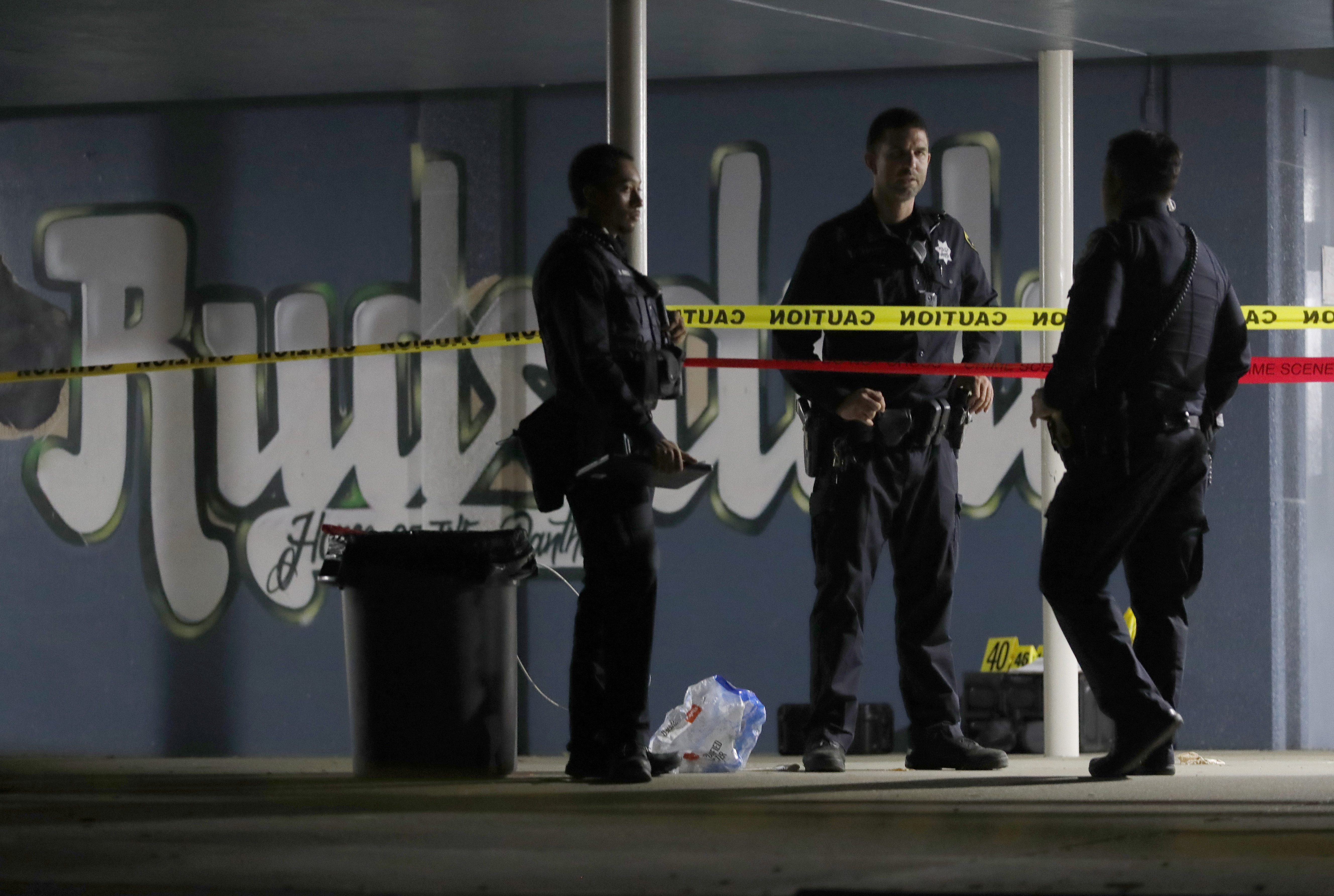 OAKLAND, CALIFORNIA - SEPTEMBER 28: Oakland police are seen as they investigate a mass shooting at the King Estates Complex school campus on Fontaine Street in East Oakland, Calif., on Wednesday, Sept. 28, 2022. Six adult victims were transported to local hospitals and two remain in critical condition. (Jane Tyska/Bay Area News Group)