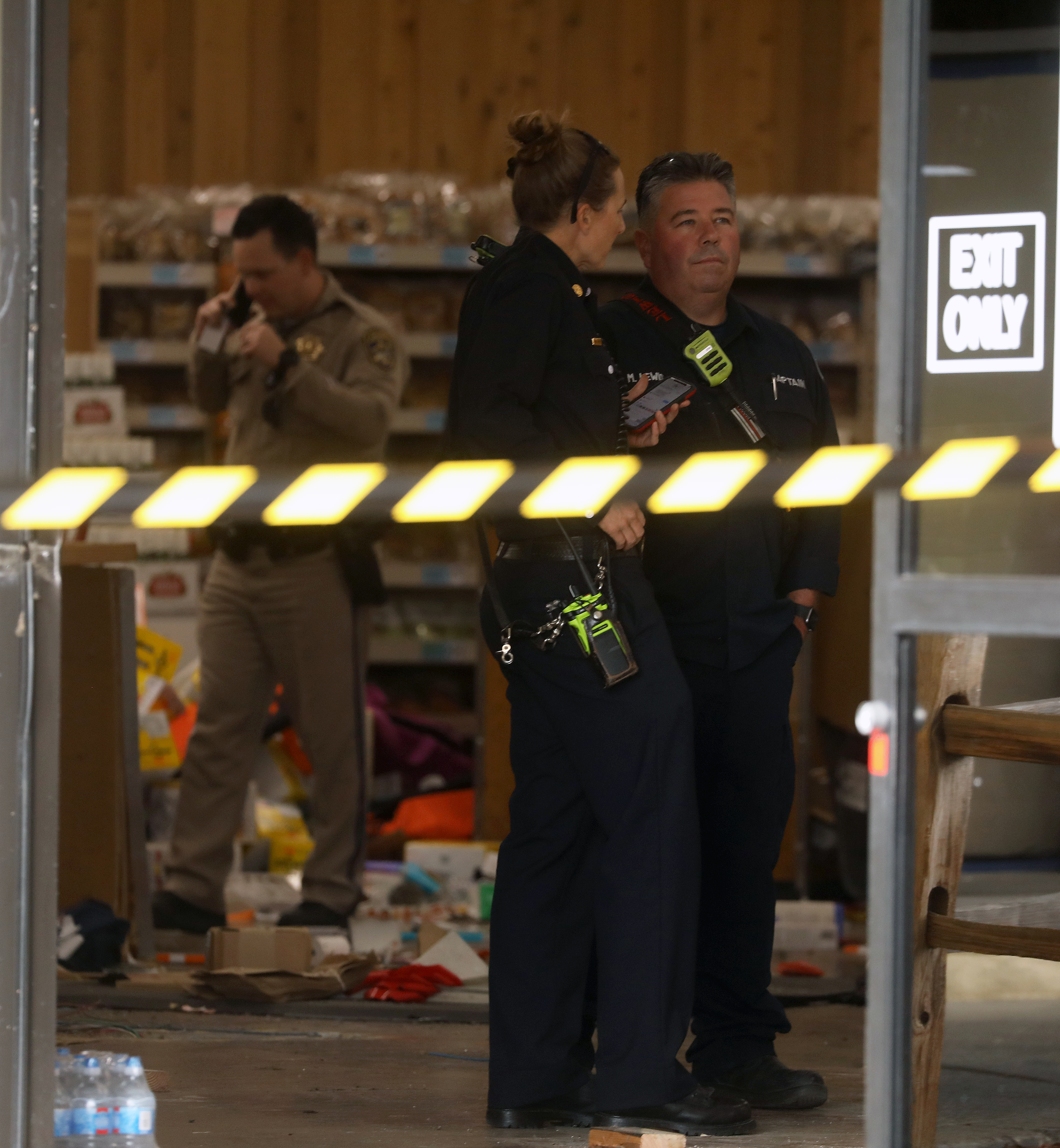 Emergency personnel work at scene after a vehicle drove into a Trader Joe's in Castro Valley