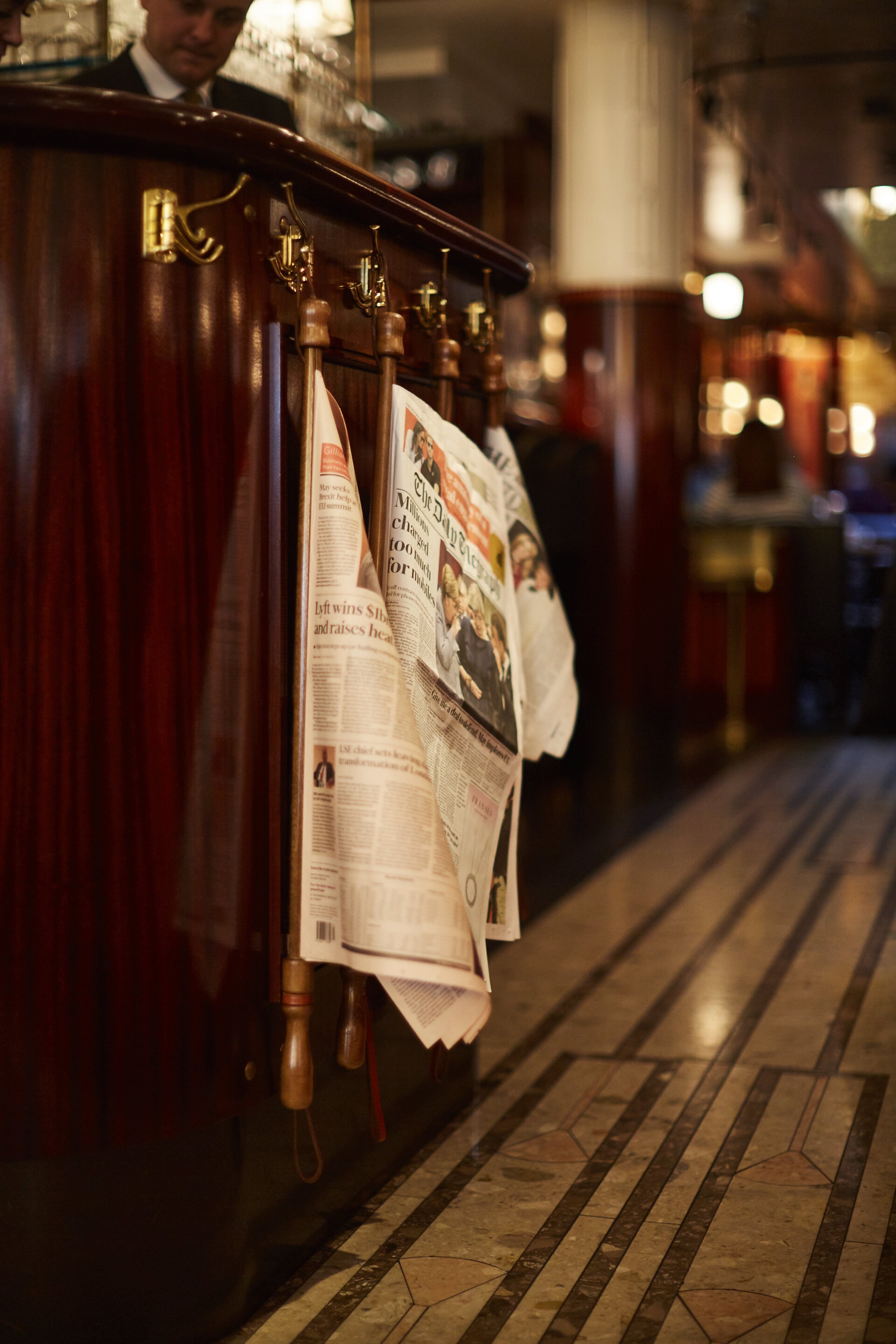 Fischer's Interior with wooden newspaper holders