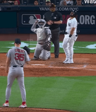 Major League Baseball umpire uses football down indicators to keep track of balls and strikes