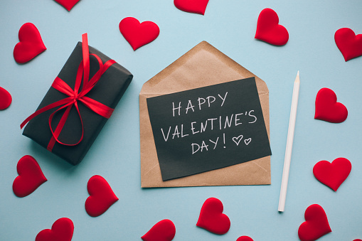 Planning to stay in this Valentine's Day? Then kick the fun and festivities up a notch by watching a romantic movie, reading a saucy novel or listening to an interesting podcast. (Credit/Anna Blazhuk)