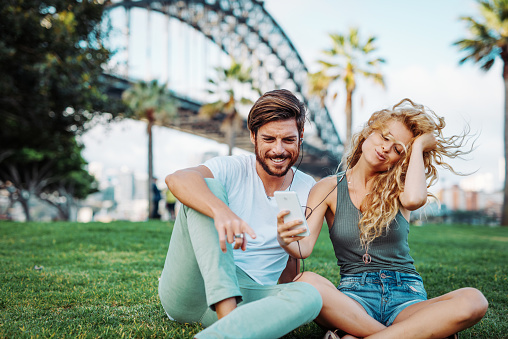 Podcasts are a fun way to hear interesting stories while on the go, at a park, in bed or while driving. (Credit/Getty Images)