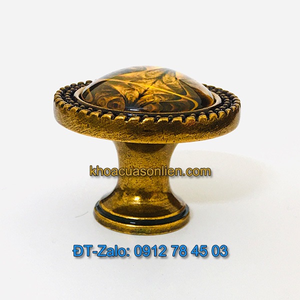 Báo giá nơi bán Mẫu núm tủ mặt thủy tinh hoa văn màu hổ phách tân cổ điển NT-009 giá rẻ tại Hà Nội