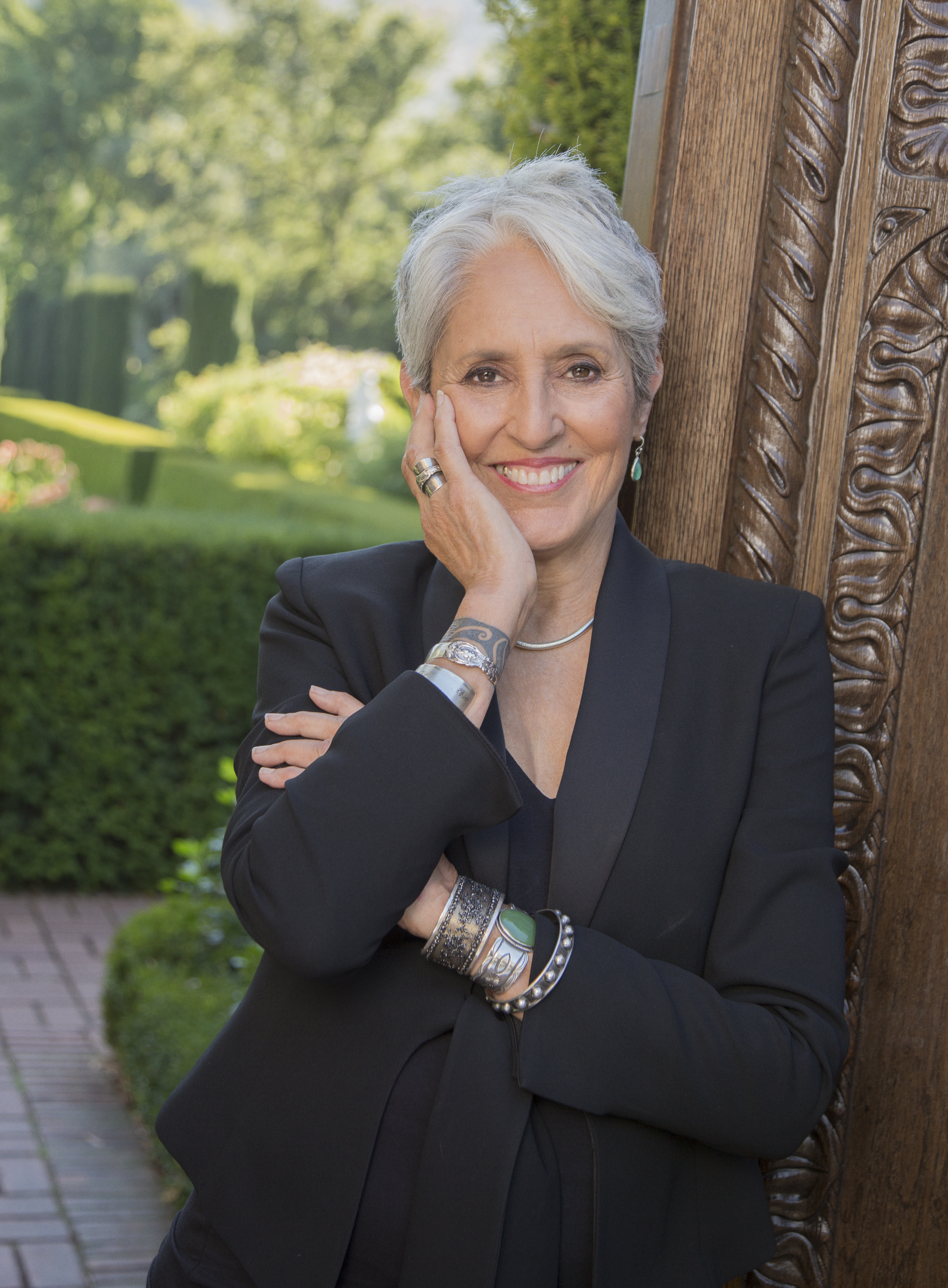 "It's the same as the singing. It's some kind of gift. It's channeling from somewhere. I don't know where," says Joan Baez of her upside-down drawings. (Photo by Dana Tynan)