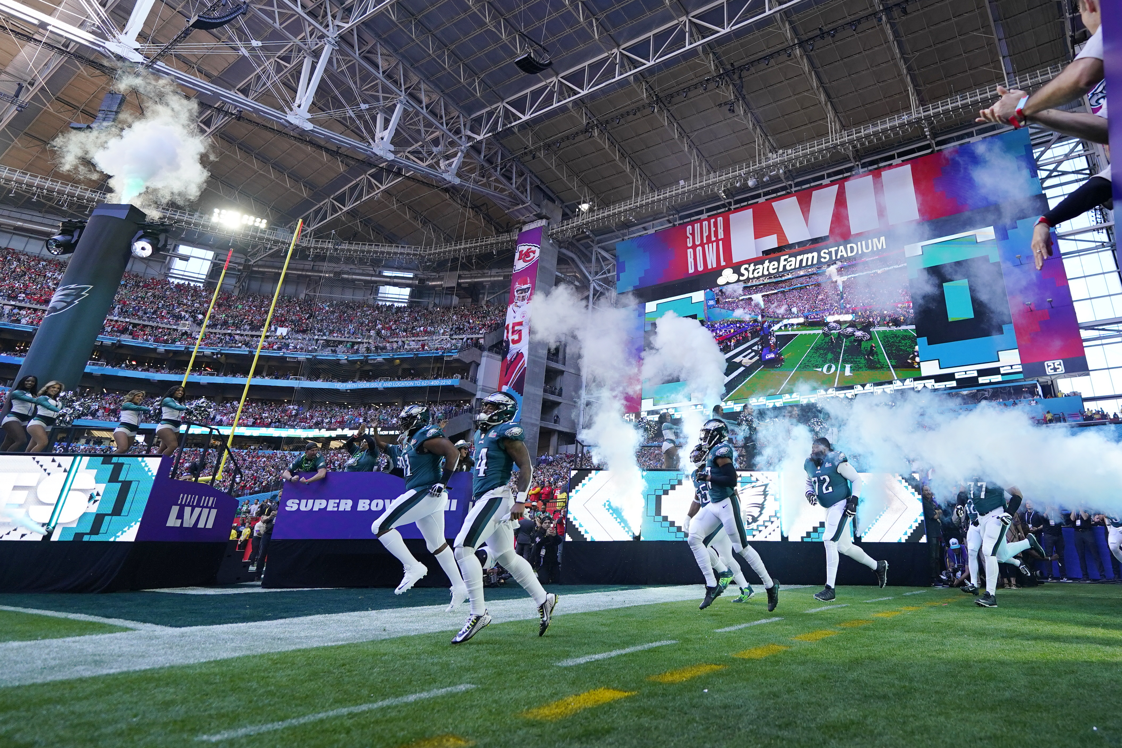 Philadelphia Eagles players enter the field before the NFL Super Bowl 57 football game between the Kansas City Chiefs and the Philadelphia Eagles, Sunday, Feb. 12, 2023, in Glendale, Ariz. (AP Photo/Matt Slocum)