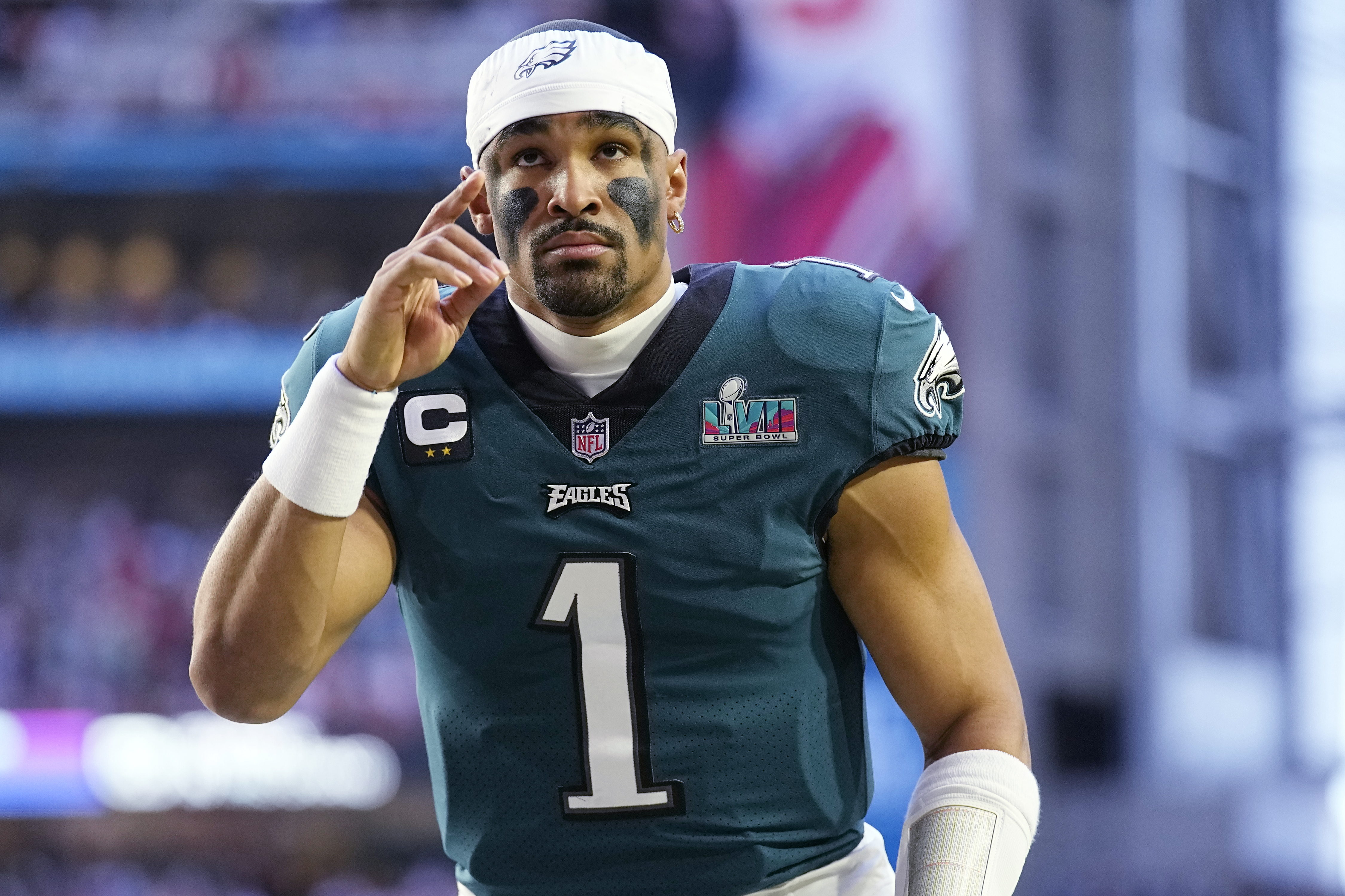 Philadelphia Eagles quarterback Jalen Hurts (1) runs on to the field before the start of the NFL Super Bowl 57 football game between the Kansas City Chiefs and the Philadelphia Eagles, Sunday, Feb. 12, 2023, in Glendale, Ariz. (AP Photo/Abbie Parr)