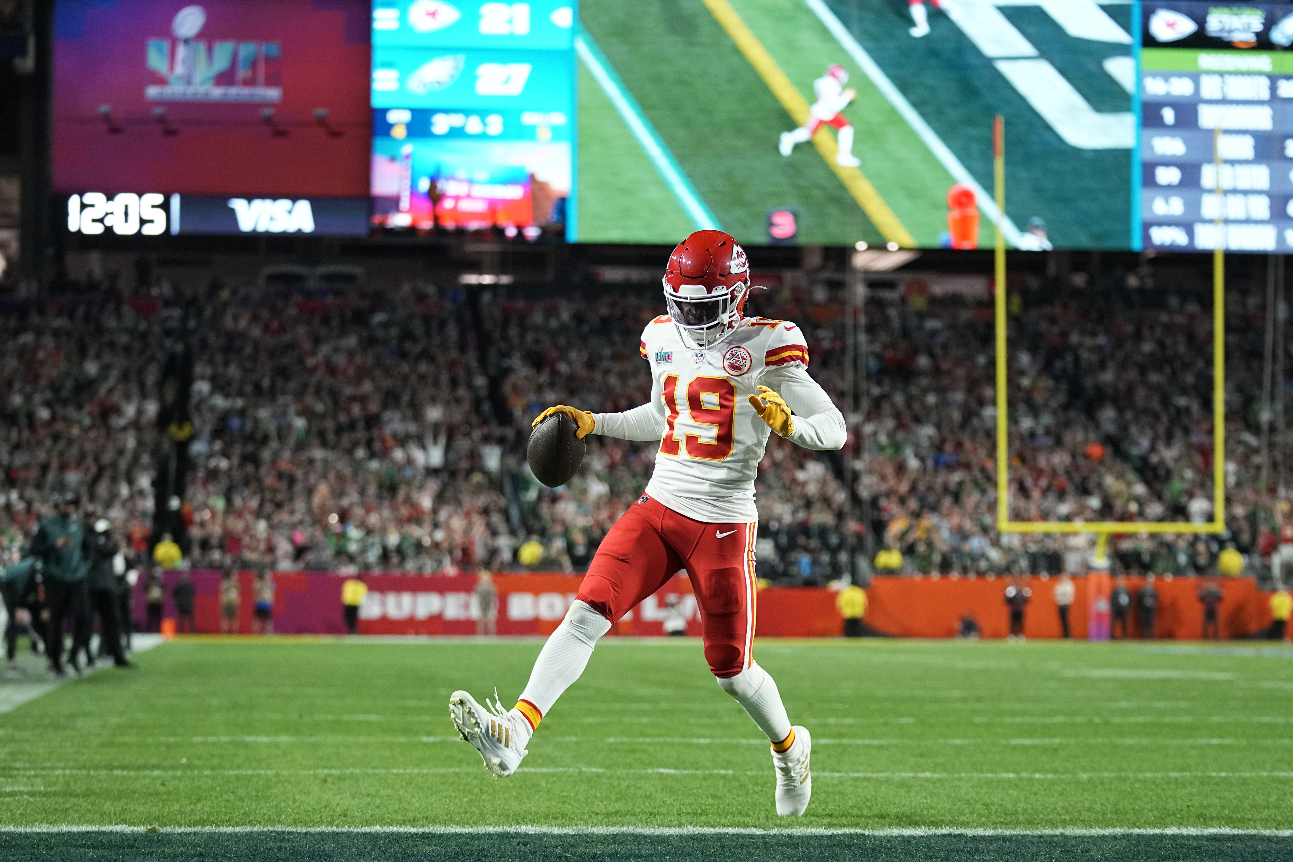 Kansas City Chiefs wide receiver Kadarius Toney (19) scores a touchdown against the Philadelphia Eagles during the second half of the NFL Super Bowl 57 football game, Sunday, Feb. 12, 2023, in Glendale, Ariz. (AP Photo/Abbie Parr)