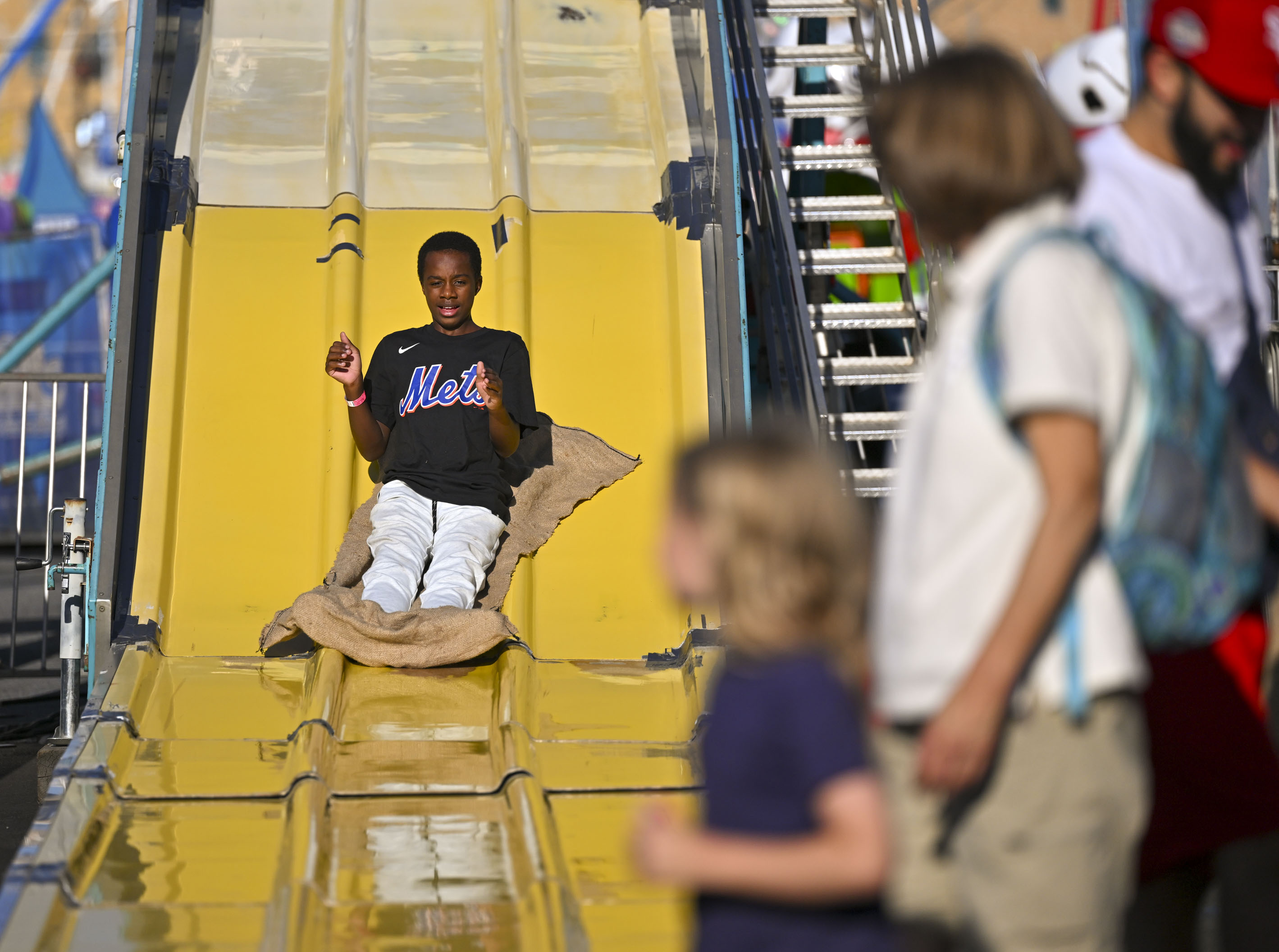 People enjoy the sights, sounds and food Thursday, Aug. 31, 2023, at the Allentown Fair. (April Gamiz/The Morning Call)