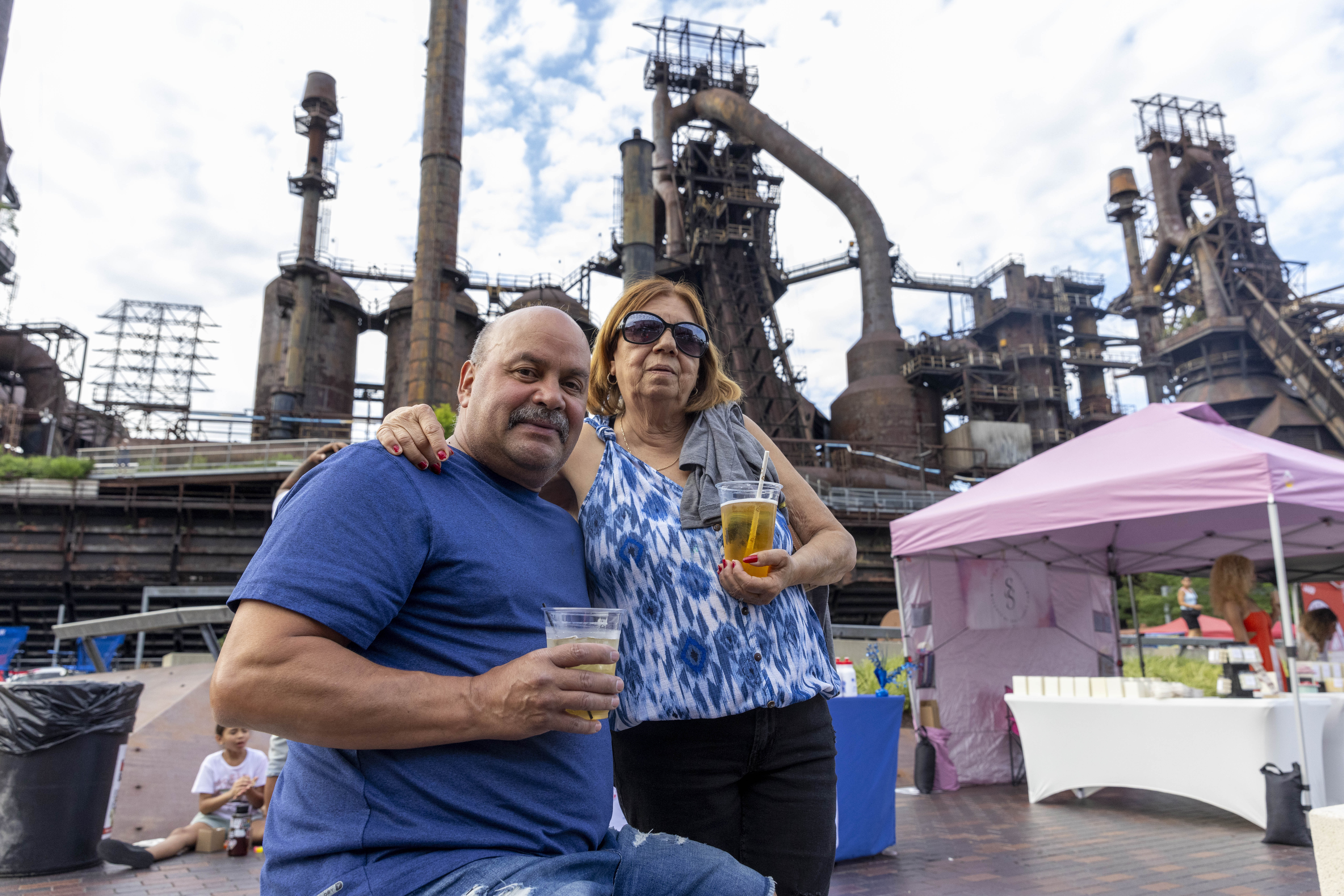 Angel Gines, left, stands with Luc Gines Friday, June 28, 2024, during the 13th annual ¡Sabor! Latin Festival at SteelStacks in Bethlehem. The festival is a celebration of Latin heritage including music, food and family fun. (Emma Reed/The Morning Call)