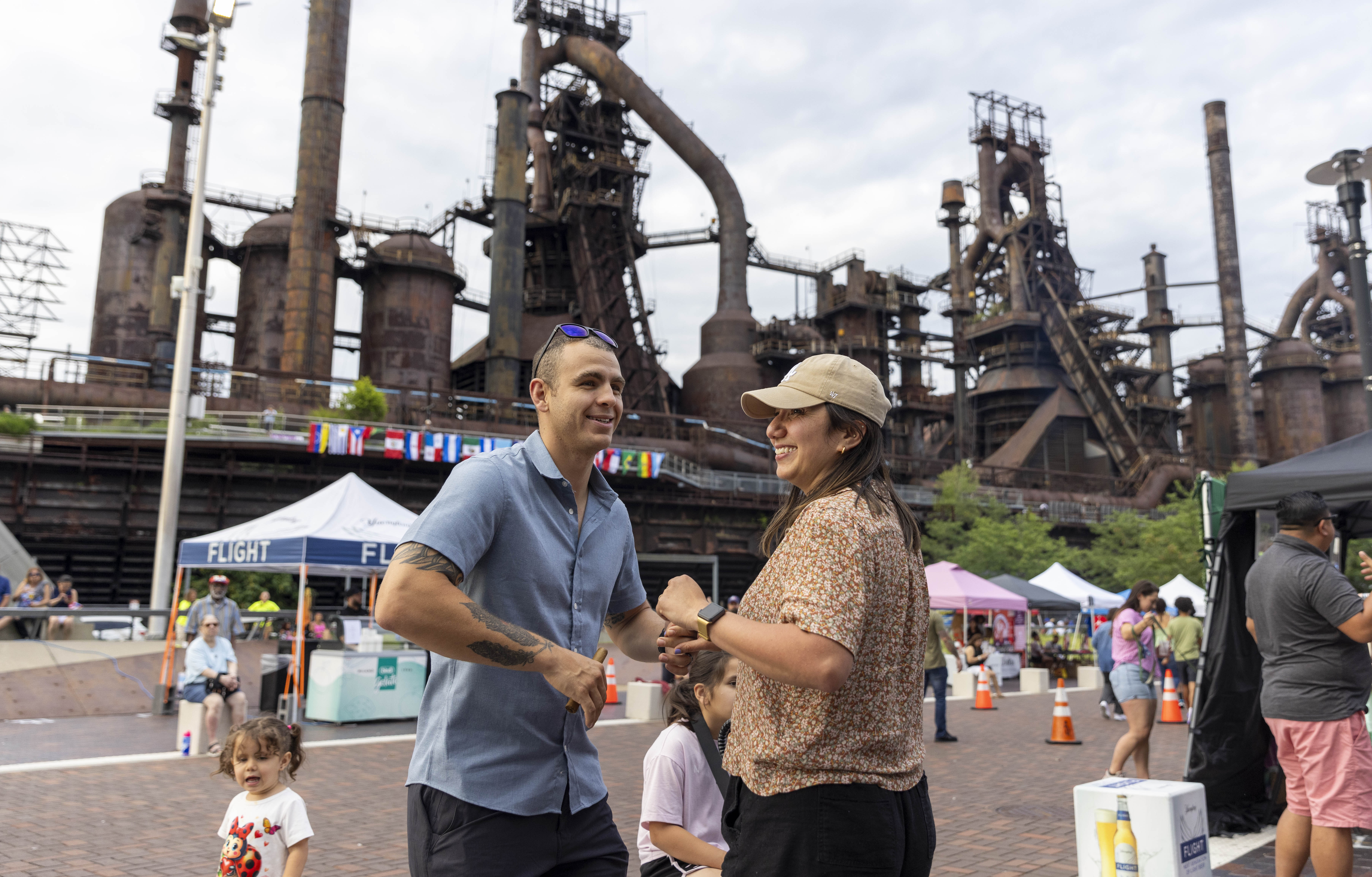 Orlando Franqui, left, dances with Nadienka Franqui Friday, June 28, 2024, during the 13th annual ¡Sabor! Latin Festival at SteelStacks in Bethlehem. The festival is a celebration of Latin heritage including music, food and family fun. (Emma Reed/The Morning Call)