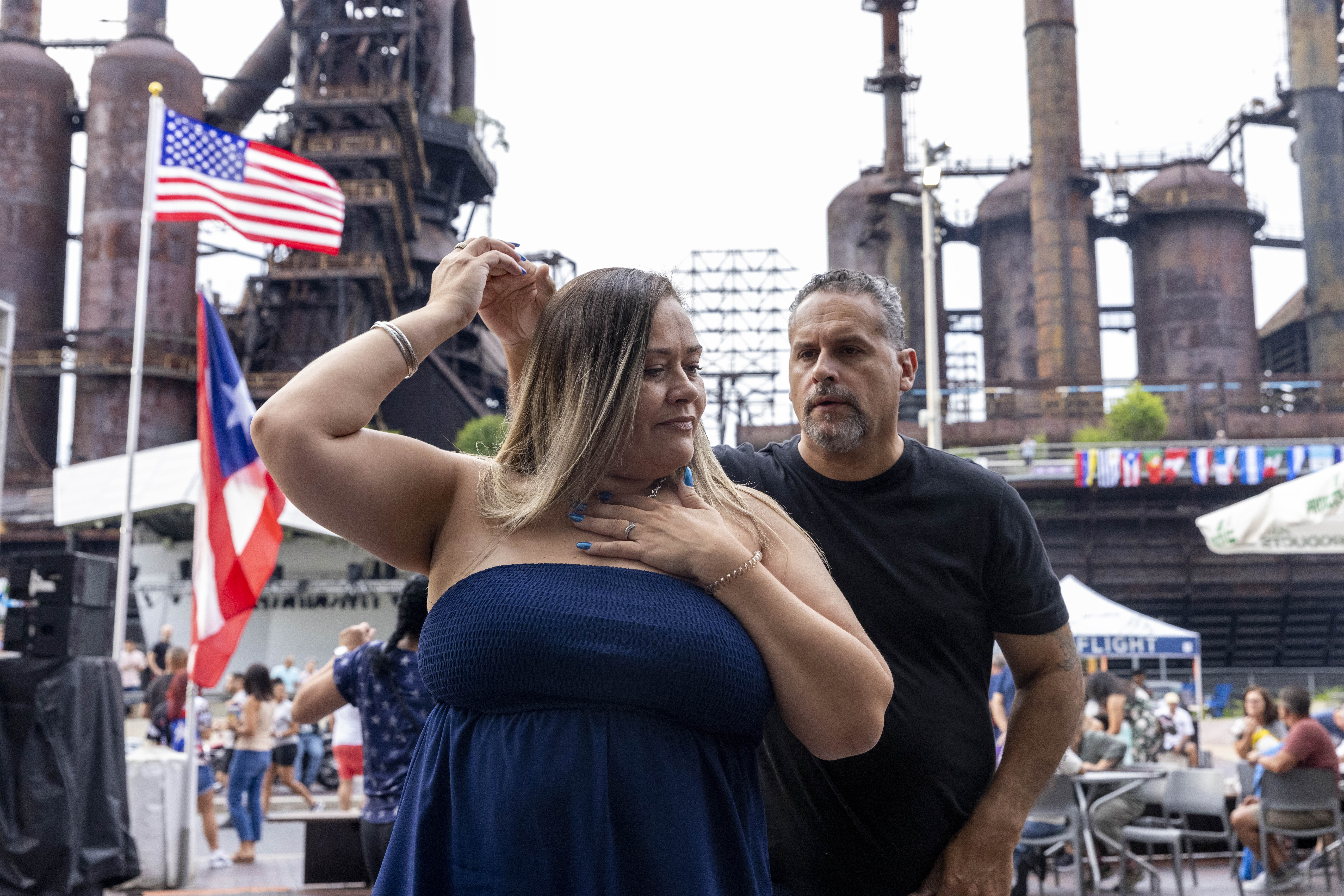 Nancy Soto dances with Louis Soto Friday, June 28, 2024, during the 13th annual ¡Sabor! Latin Festival at SteelStacks in Bethlehem. The festival is a celebration of Latin heritage including music, food and family fun. (Emma Reed/The Morning Call)